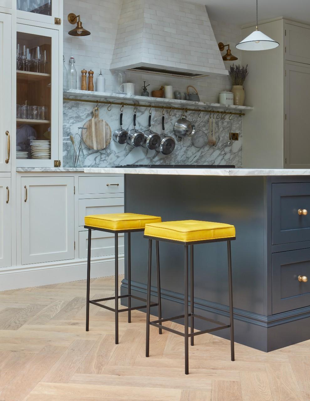 The Henri Bar Stool is defined by the elegant lines of its handcrafted steel base and topped with a comfortable cushion.

Upholstered using the customer's choice of fabric and/or leather. Requirement: 1.5 sq/m of fabric or 17 sq/ft of