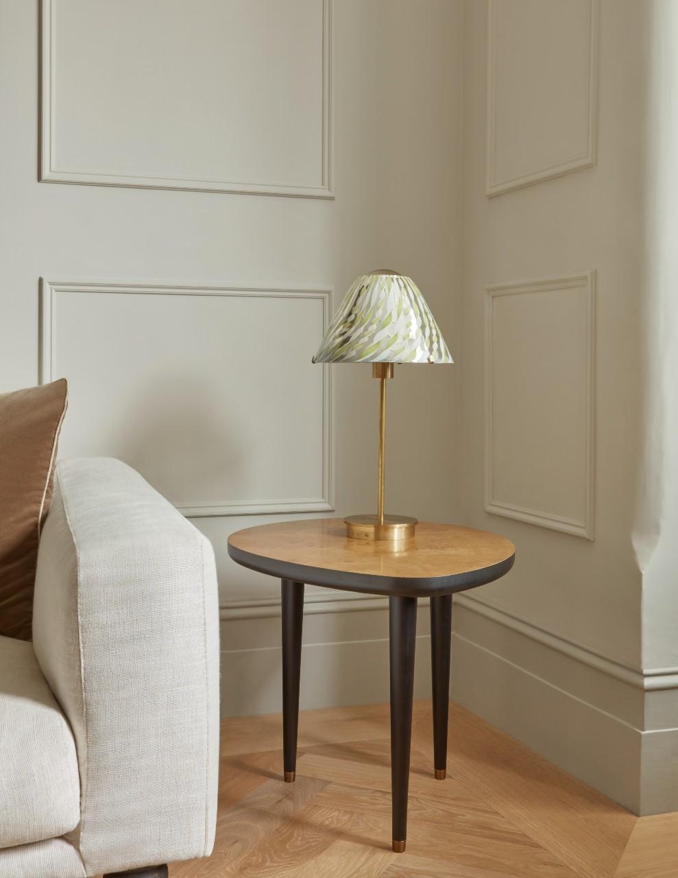 The edge of the top has been left square in order to accentuate the crisp outline of the shape. The under edge has been softened to enhance the organic shape we revere.

Available in your choice of either natural burr oak or vintage burr oak.