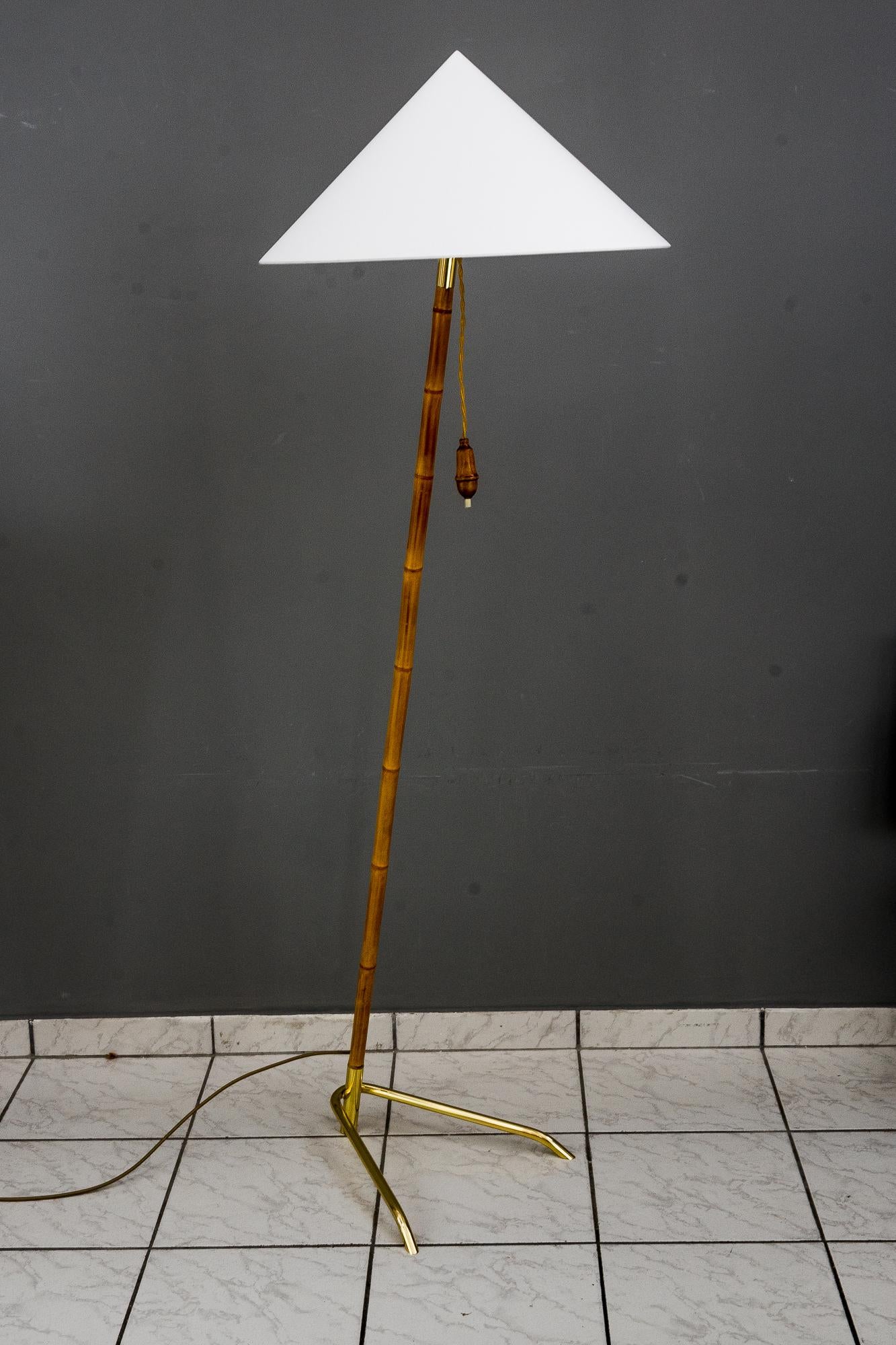 Rupert Nikoll floor lamp vienna around 1950s
Brass parts polished and stove enamelled
Bamboo stem
Shade is replaced ( new ).