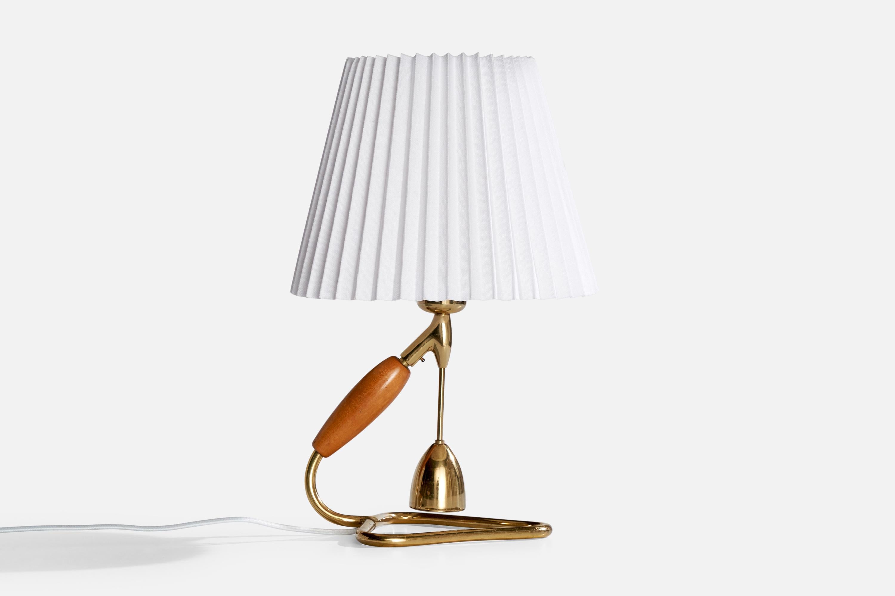 Lampada da tavolo in ottone, legno e tessuto bianco progettata e prodotta in Austria, anni '50 circa.

Dimensioni della lampada con paralume (pollici): 14,25