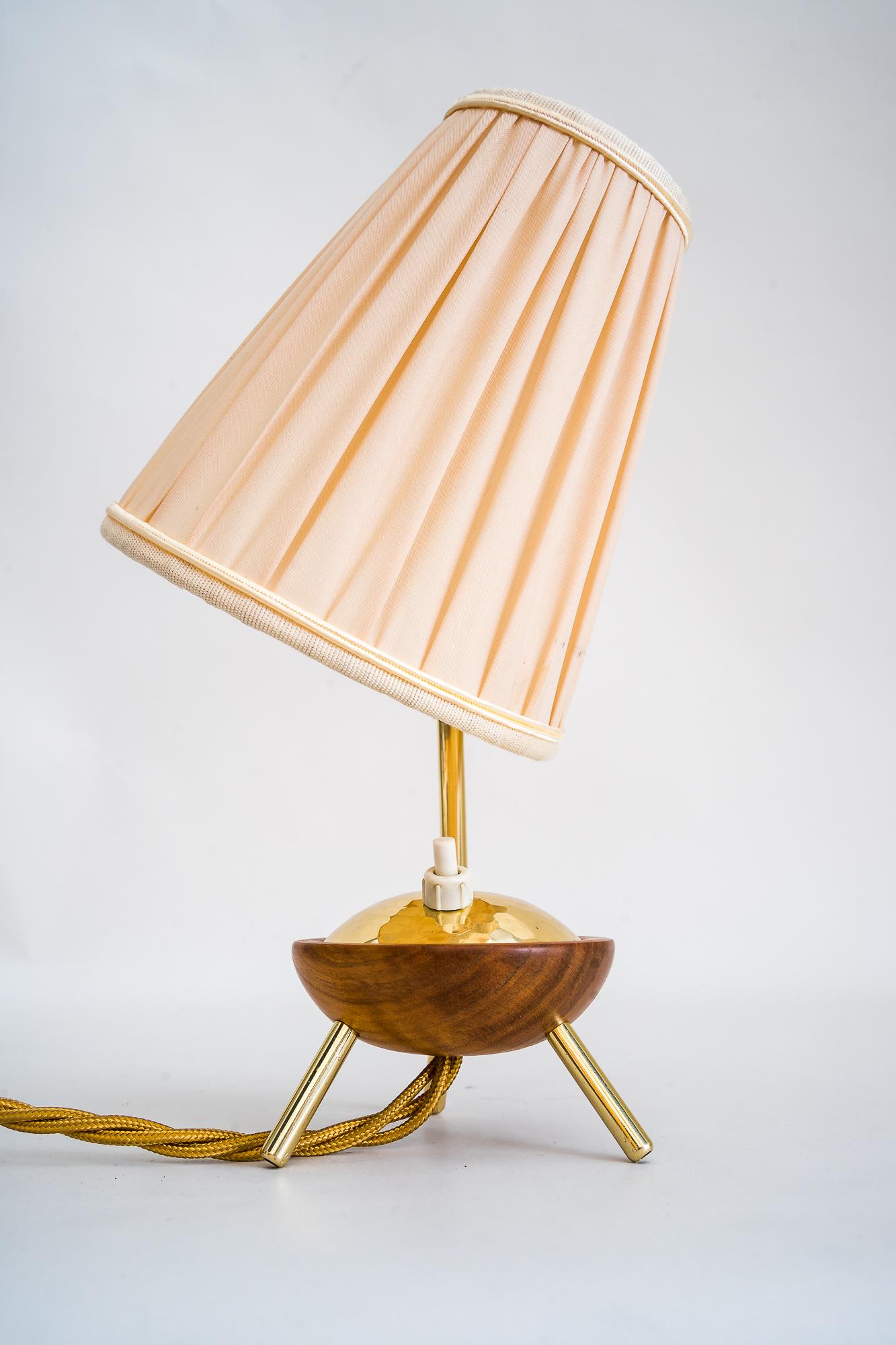 Rupert Nikoll table lamp, Vienna, 1950s
Polished and stove enamelled
Cherry wood polished 
Fabric shade is replaced (new).