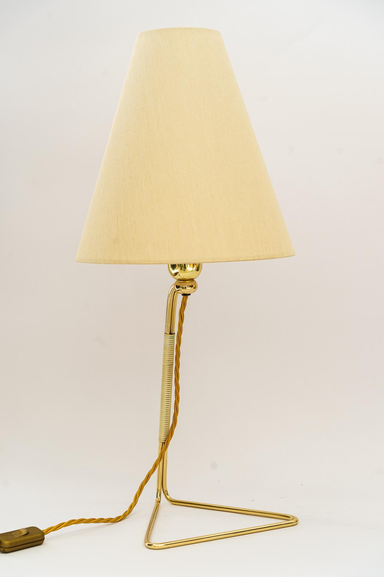 Rupert Nikoll table lamp vienna around 1950s
Brass polished and stove enameled
The fabric shade is replaced ( new )