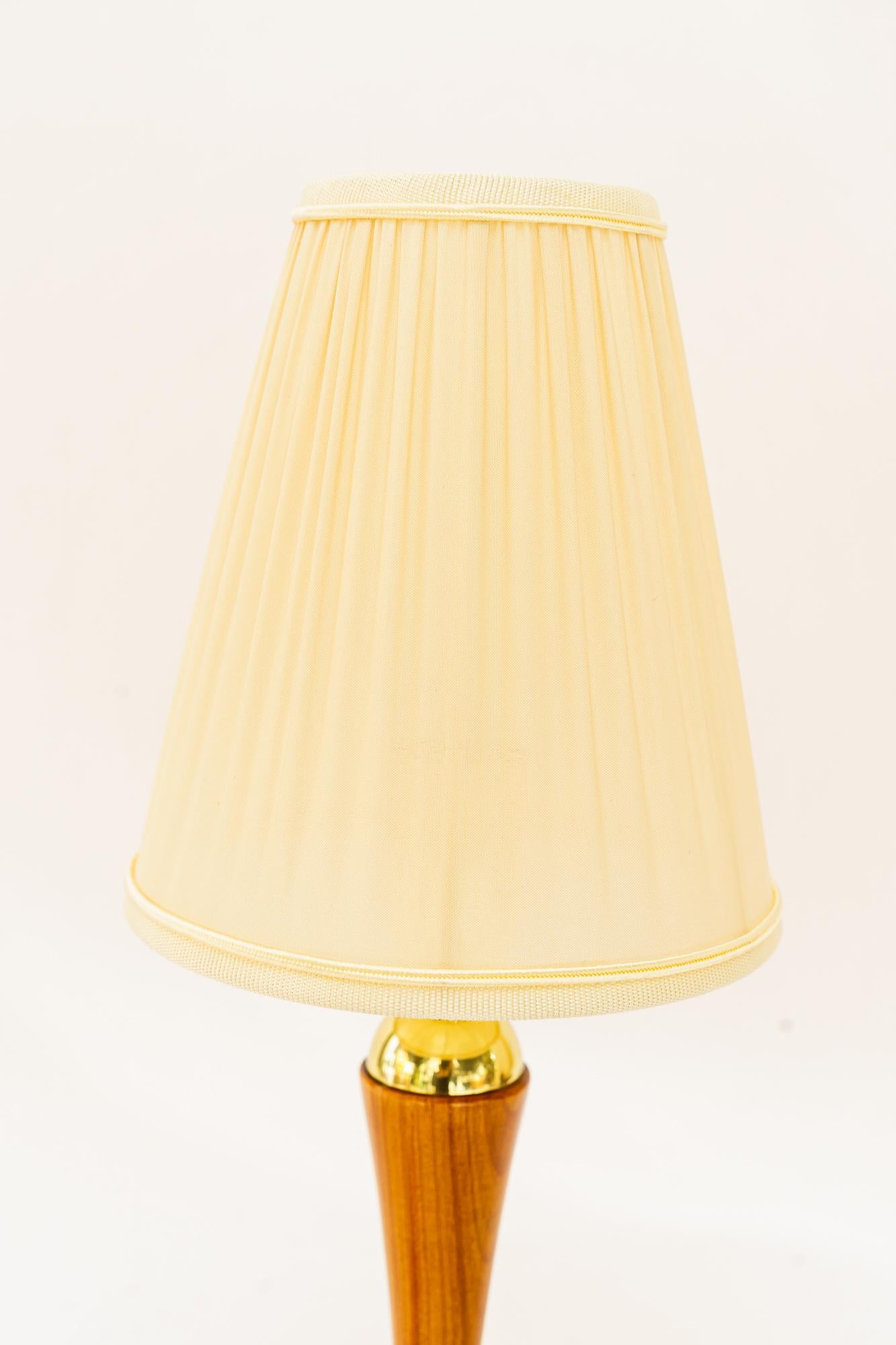 Austrian Rupert Nikoll table lamp with cherry wood and fabric shade vienna around 1950s For Sale