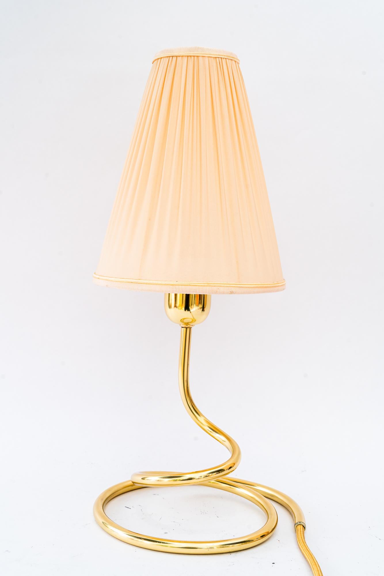 Rupert Nikoll Table lamp with fabric shade vienna around 1950s
Brass polished and stove enameled
The fabric shade is replaced ( new )
