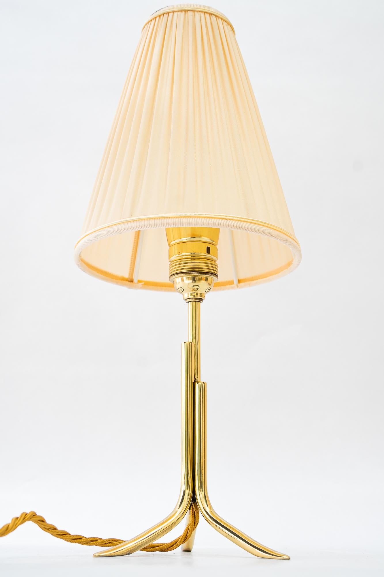 Rupert Nikoll table lamp with fabric shade vienna around 1960s
Brass polished and stove enameled
The fabric shade is replaced ( new )