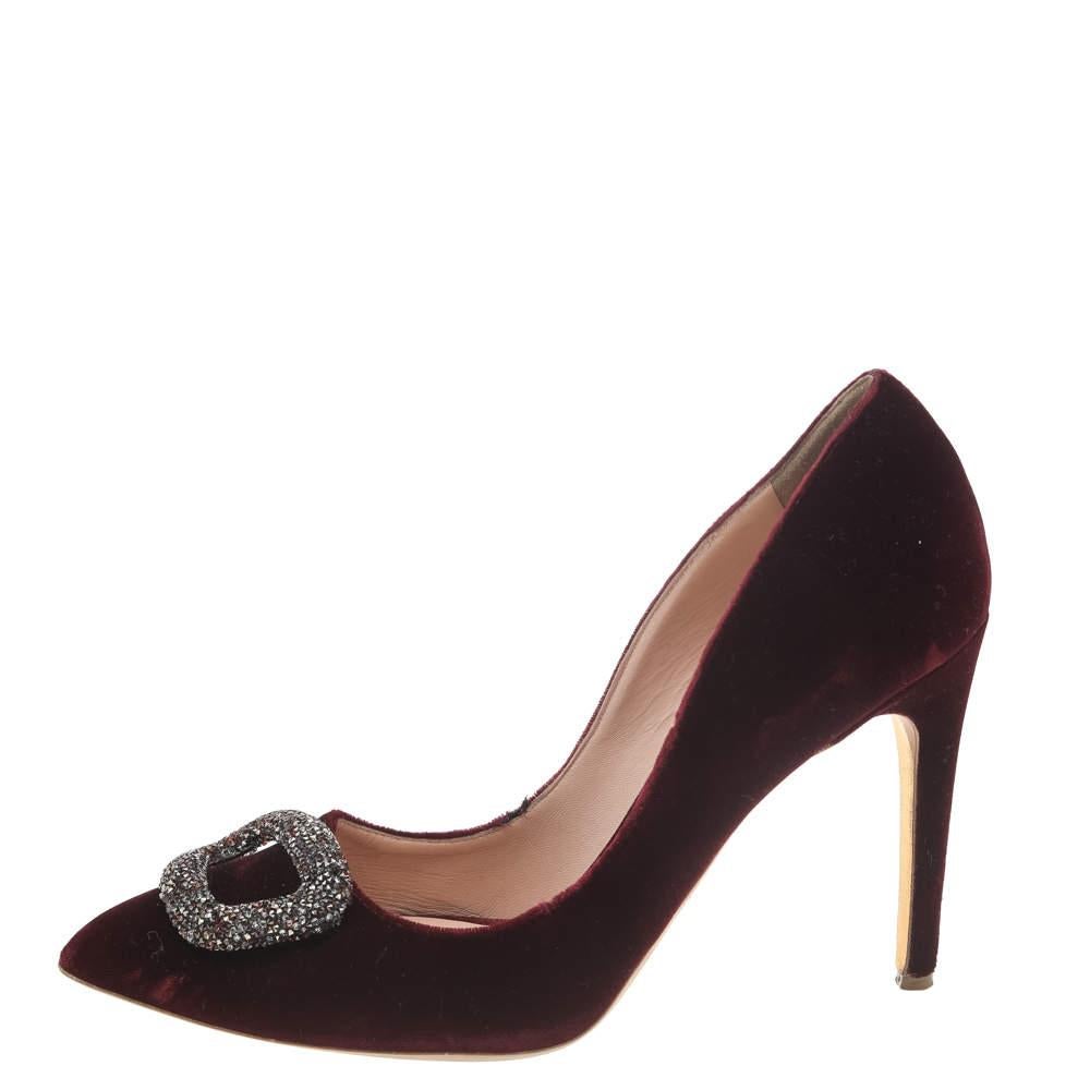 Rupert Sanderson is well-known for his graceful designs, and his label is synonymous with opulence, femininity, and elegance. These pumps are crafted from velvet into a pointed toe silhouette augmented by the crystal embellishments perched on the