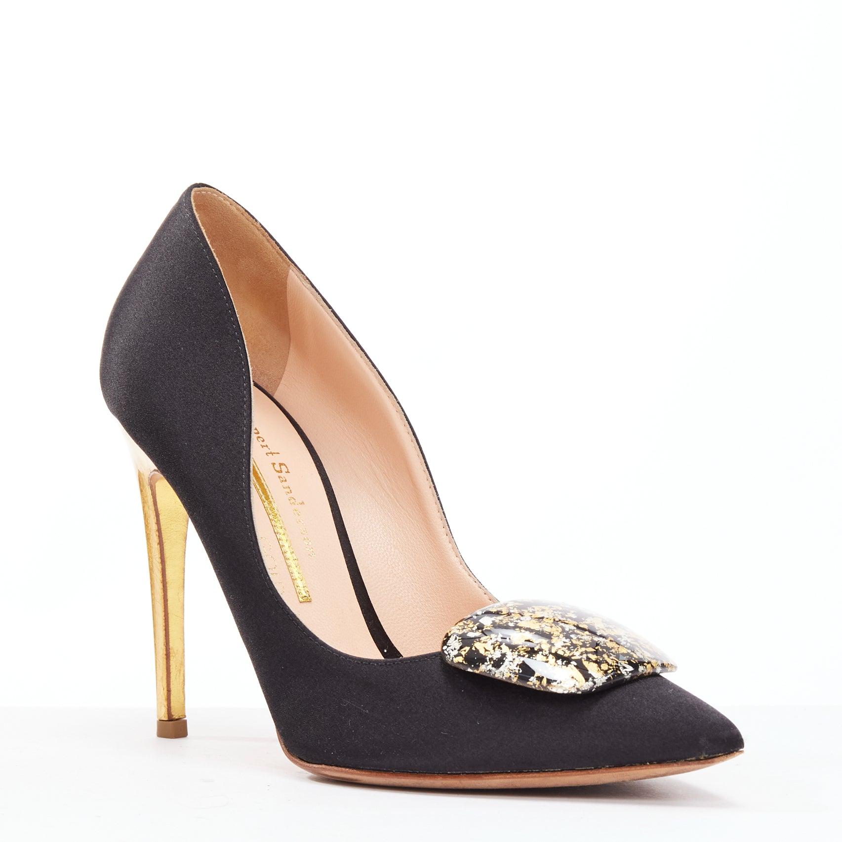 RUPERT SANDERSON Or satin noir peinture or boucle escarpins à talons EU35.5
Référence : EALU/A00057
Marque : Rupert Sanderson
Collectional : Or
Matière : Satin
Couleur : noir, or
Motif : Solide
Fermeture : Slip On
Doublure : Cuir nude
Détails