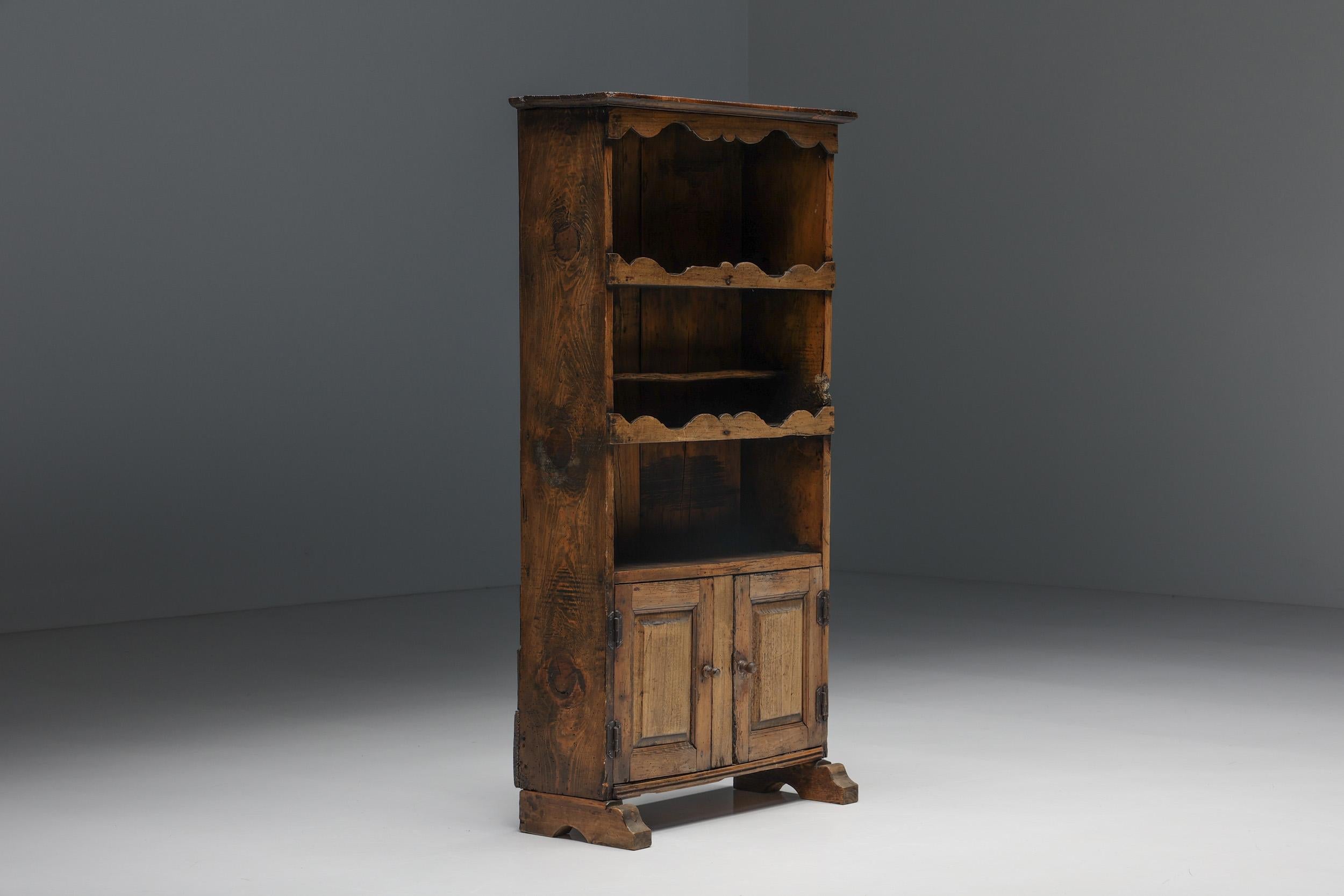 Rural; Rustic; Wabi Sabi; cupboard; Cabinet; Sideboard; Storage Space; Art Populaire; 19th Century; France; French Craftsmanship; Haute-Savoie; Breton; Auvergnat;

The upper part of this rural cupboard shows three shelves, ideal to display books,
