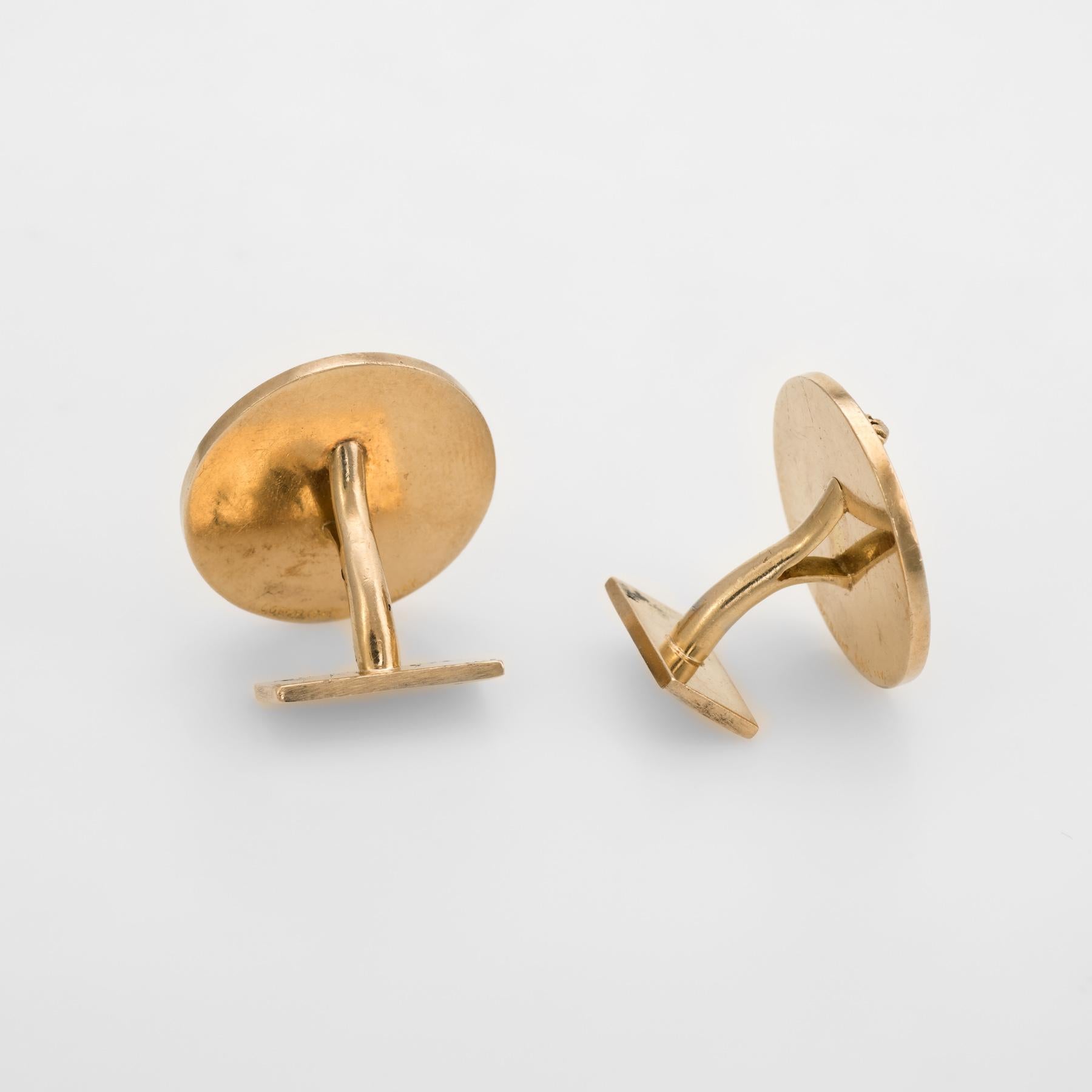Finely detailed pair of vintage Ruser cufflinks (circa 1950s to 1960s), crafted in 14 karat yellow gold. 

Saint Genesius of Rome is a legendary Christian saint, once a comedian and actor who had performed in plays that mocked Christianity. The
