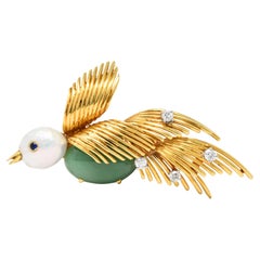 Ruser Broche oiseau en or 18 carats avec perle baroque, diamant, saphir et platine