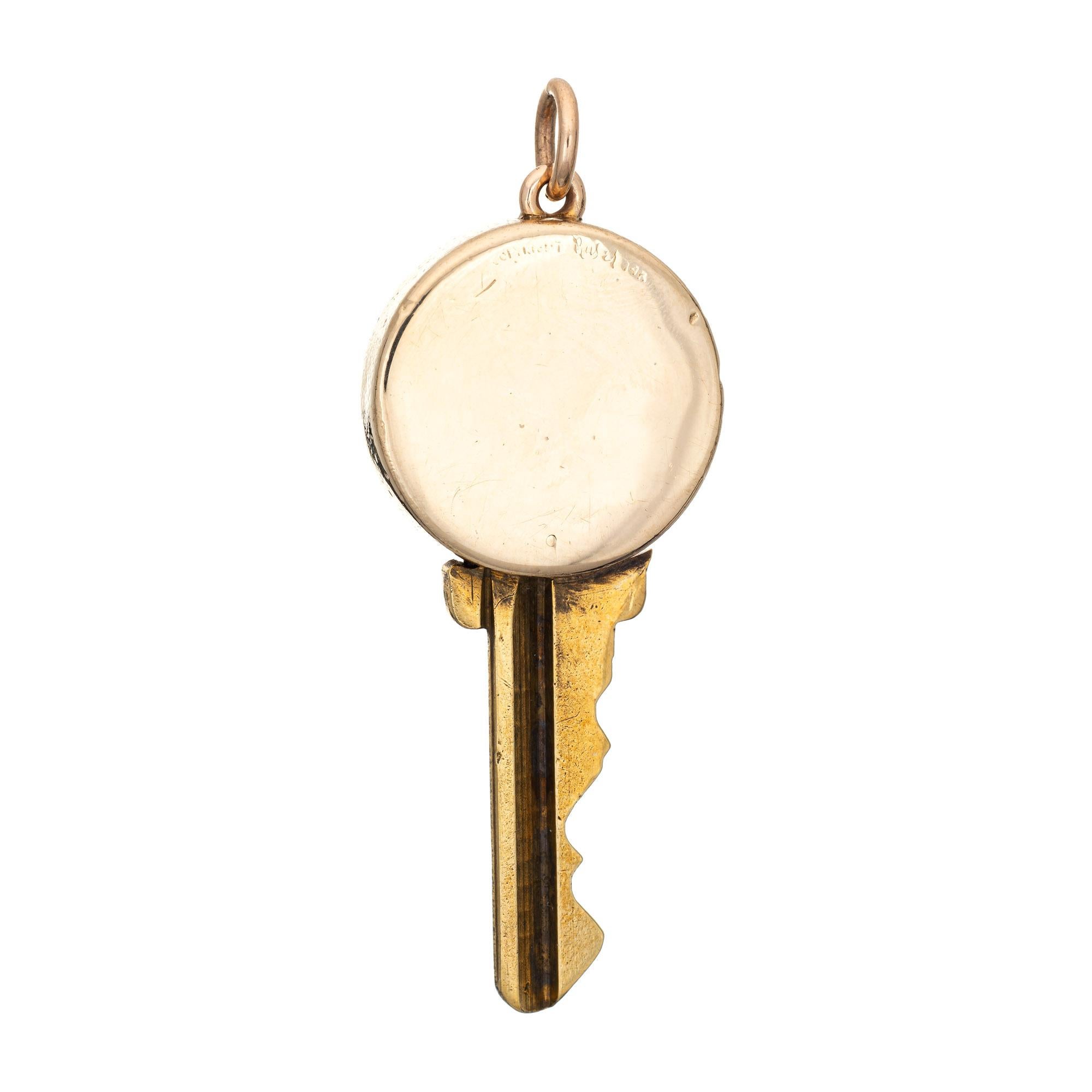 Finely detailed vintage Ruser key pendant charm (circa 1950s to 1960s), crafted in 14 karat yellow gold. 

Saint Genesius of Rome is a legendary Christian saint, once a comedian and actor who had performed in plays that mocked Christianity. The