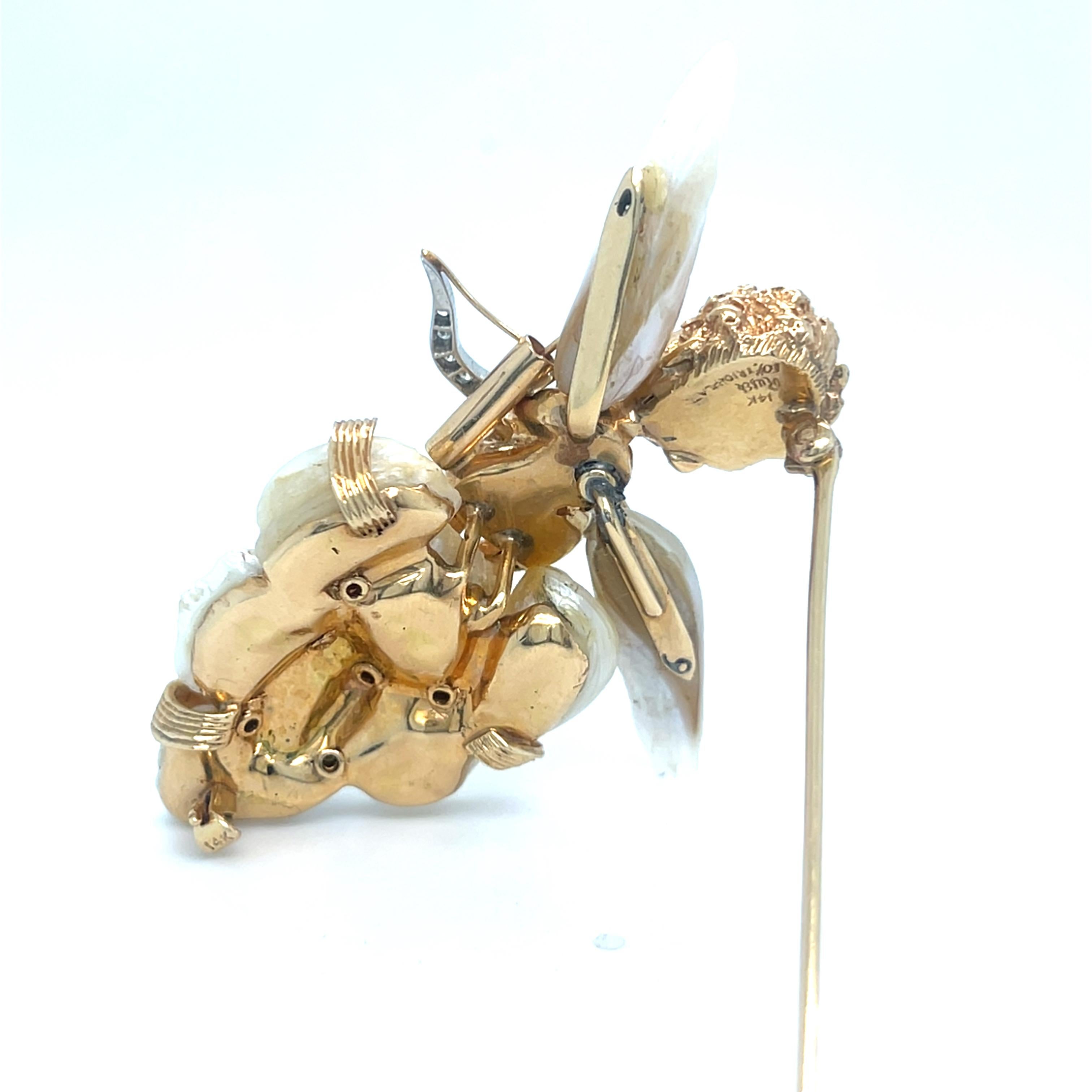 Gorgeous Baby Cherub Angel Brooch by Ruser
Features Baroque Freshwater Cultured Pearl in 14k Yellow Gold
10% Iridium Platinum
Accented by Diamonds
Includes Blue Round Sapphire Eyes
Total Length = 2-3/8