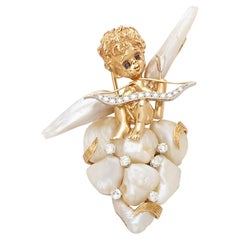 Ruser Mississippi River Pearl Diamond Sapphire and 14k Gold Cherub Angel Brooch