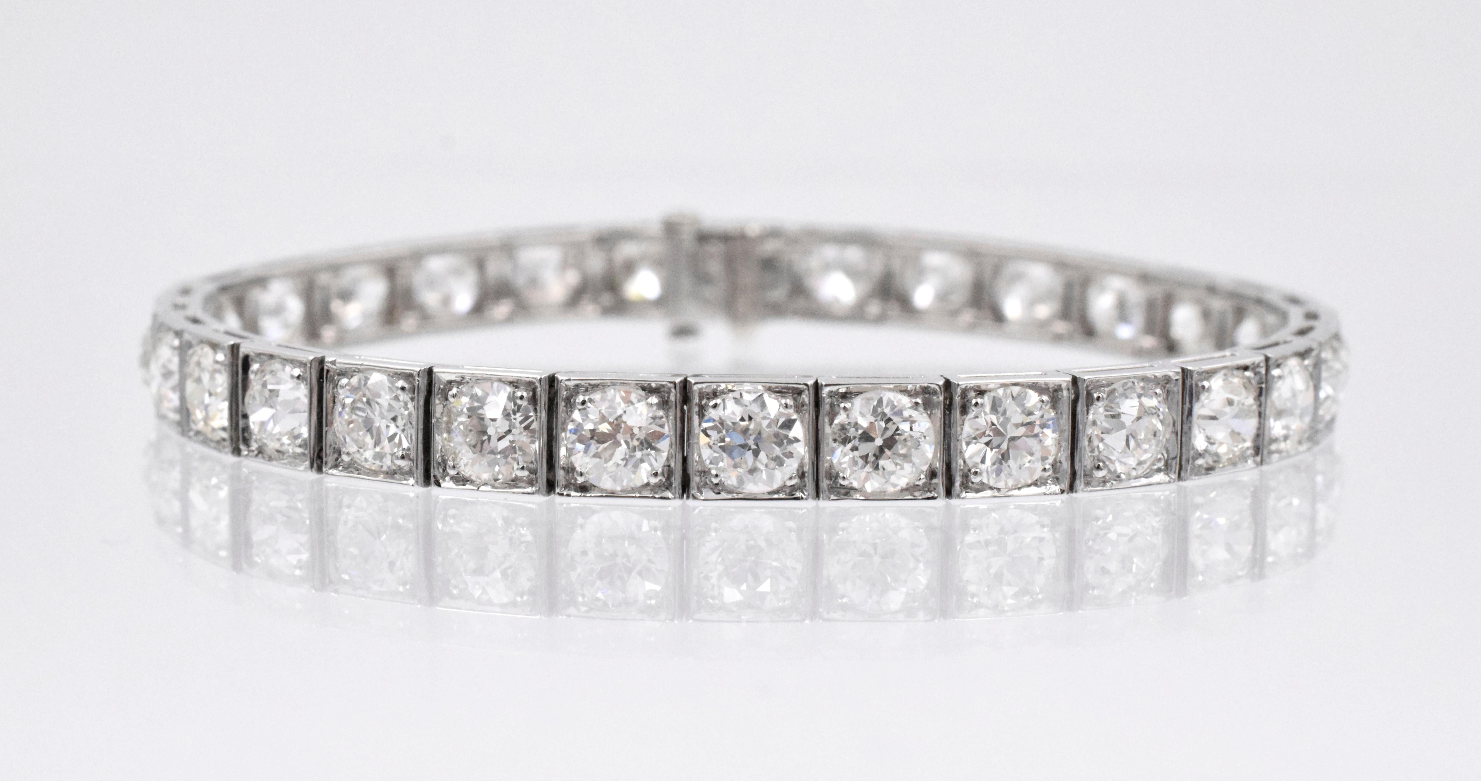 Ruser!  Classic Vintage diamond line bracelet in platinum with 30 fine 