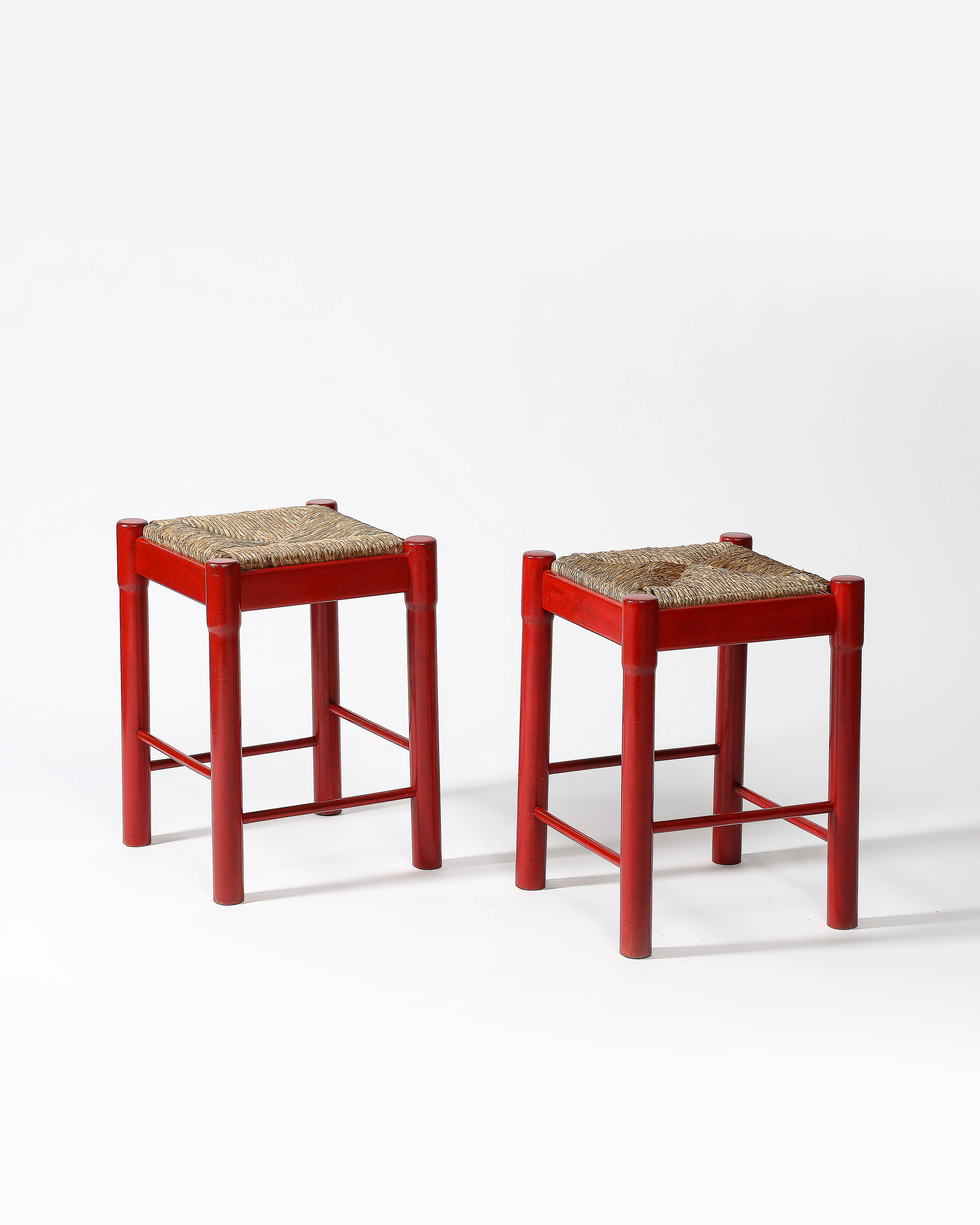Priced Individually; two available.

Bright, charming stools with hand-shaped bases and woven cord seats. 