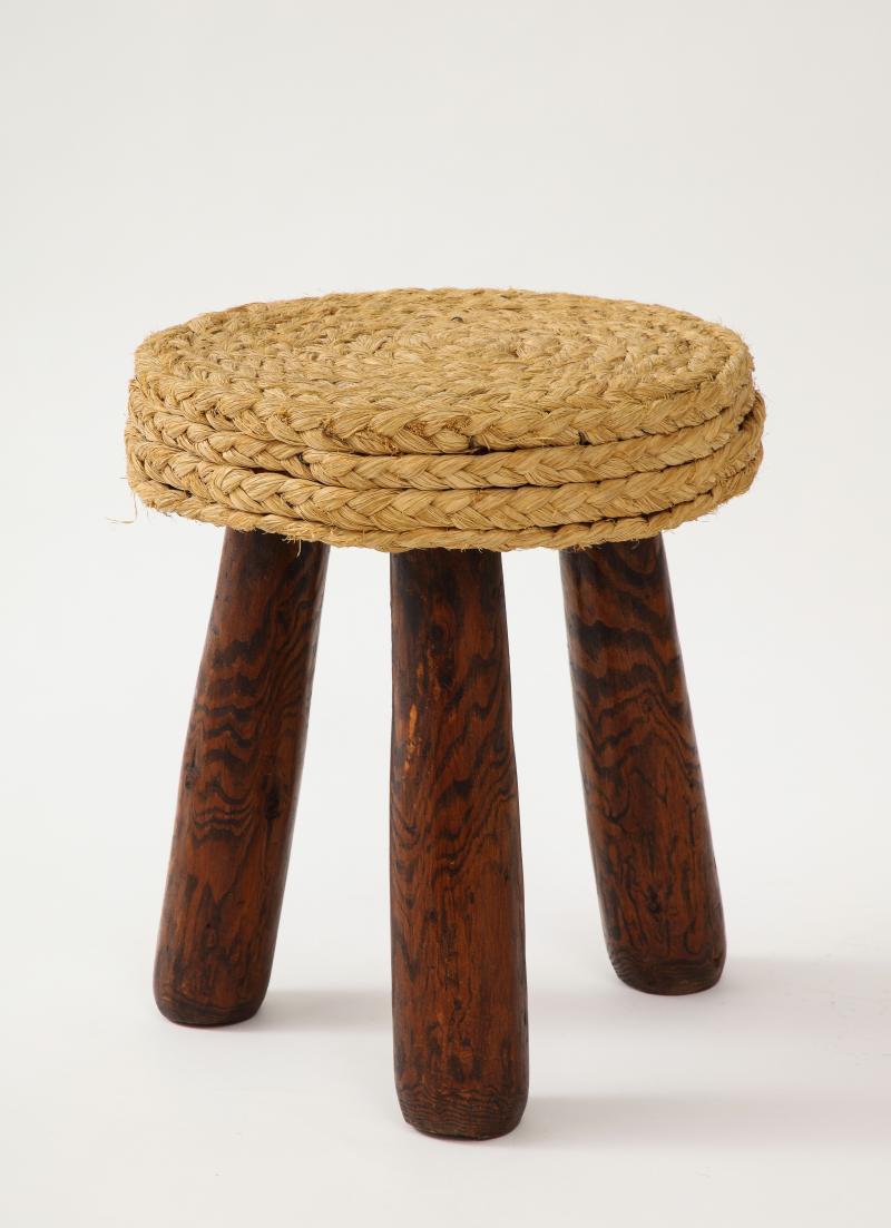 Petite French stools featuring Audoux & Minet's recognizable hand-woven rush seat and substantial, sculpted legs. A simple, elegant piece that can be placed in any room.

