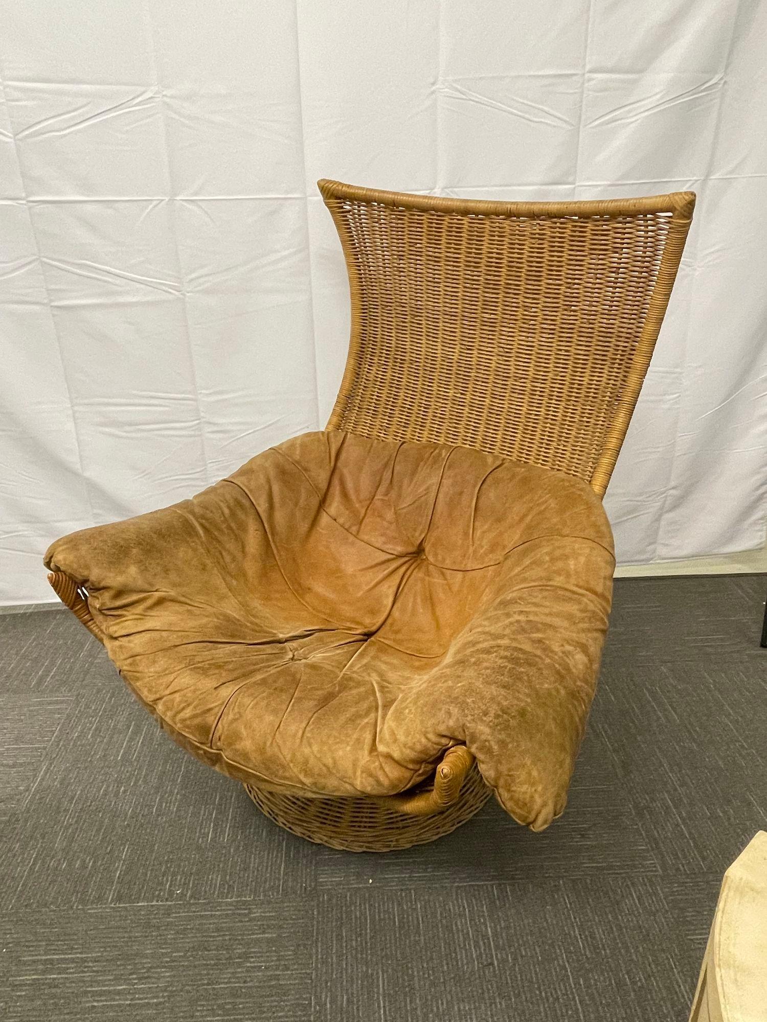 A rush seat and back wicker lounge / swivel chair, Throne Chair
 
A rush seat and back throne wicker lounge swivel chair. Having a fine custom quality with a one light brown colored worn leather throw pillow cushion. 
 
1970s Monumental swivel