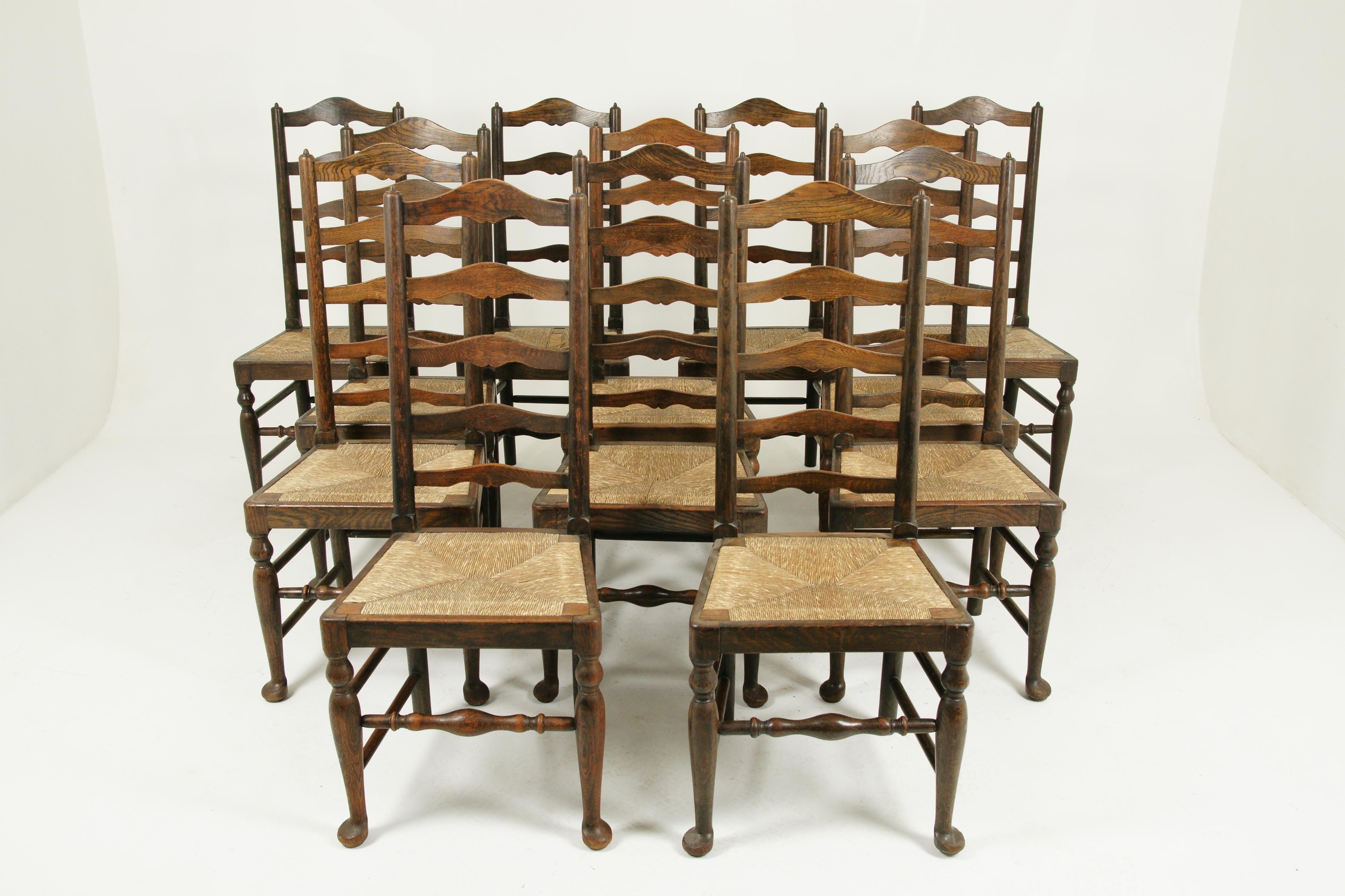 Rush seat chairs, set of 14 chairs, 12+2 chairs, 14 dining chairs, Country Kitchen, Scotland 1920, B1355

Scotland, 1920
Solid oak construction
Set of 14 ladder back rush seated chairs (including two king chairs)
Solid oak construction
Wavy
