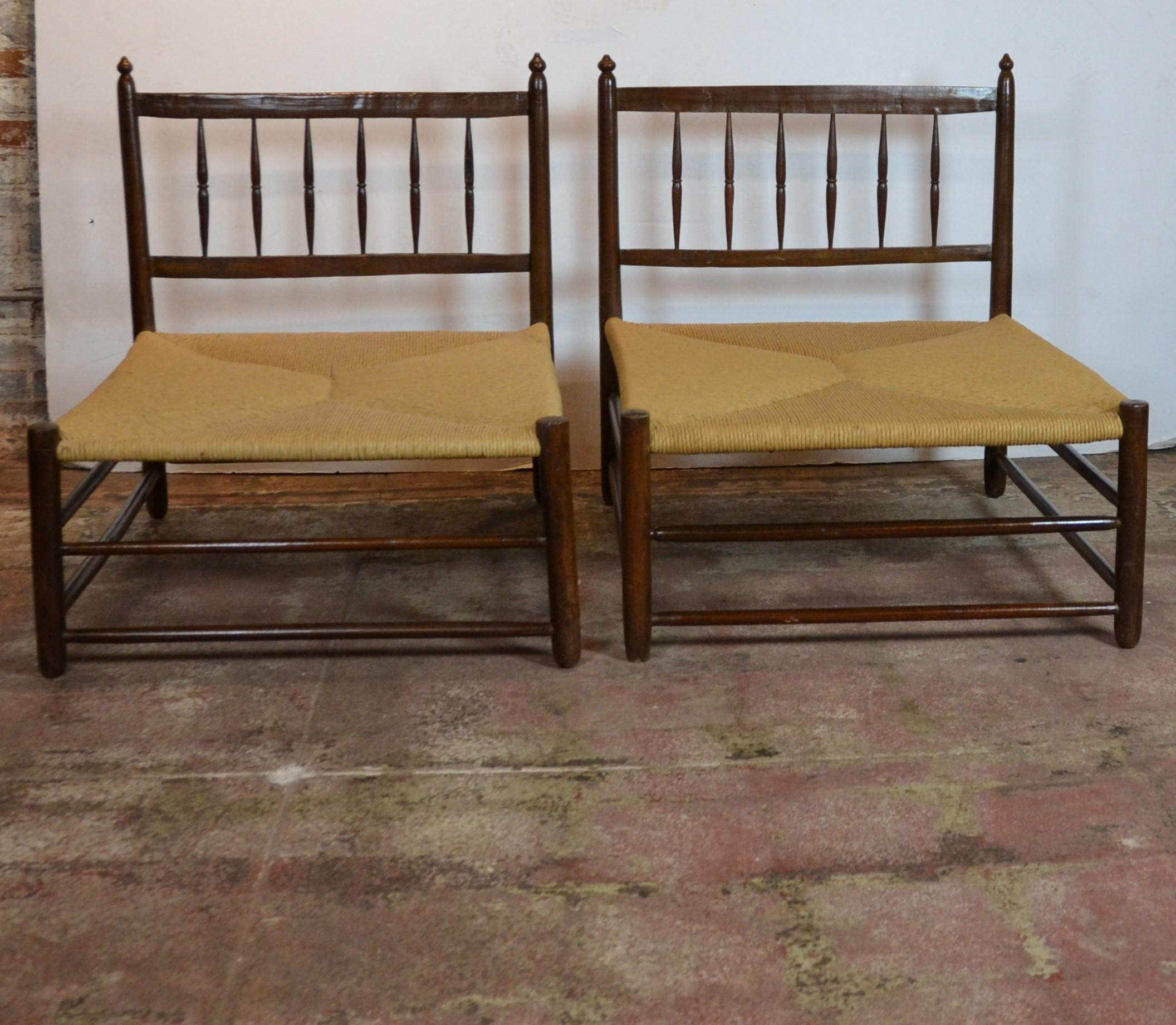 Pair of French woven seat club chairs. The loose cushions are filled with down. Excellent quality.