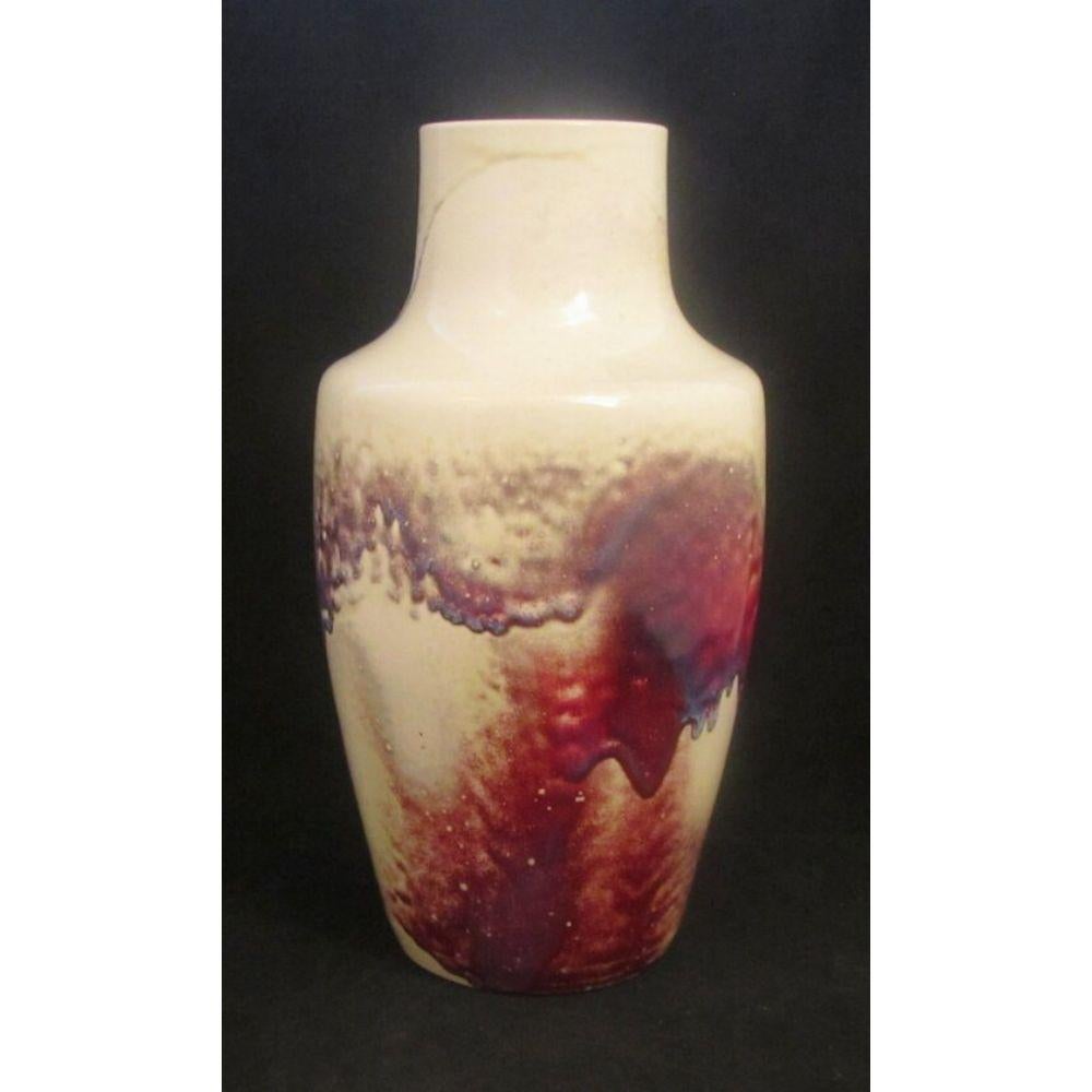 Large Ruskin High Fired vase with a sweeping curtained glaze

Dimensions: 38cm high

Complimentary Insured Postage
14 Day Money Back Guarantee
BADA Member – Buy the Best from the Best