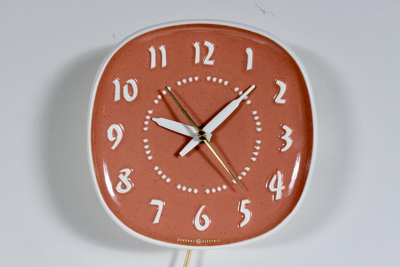 Mid-20th Century Russel Wright General Electric & Harkerware Ceramic Coral Hanging Wall Clock For Sale
