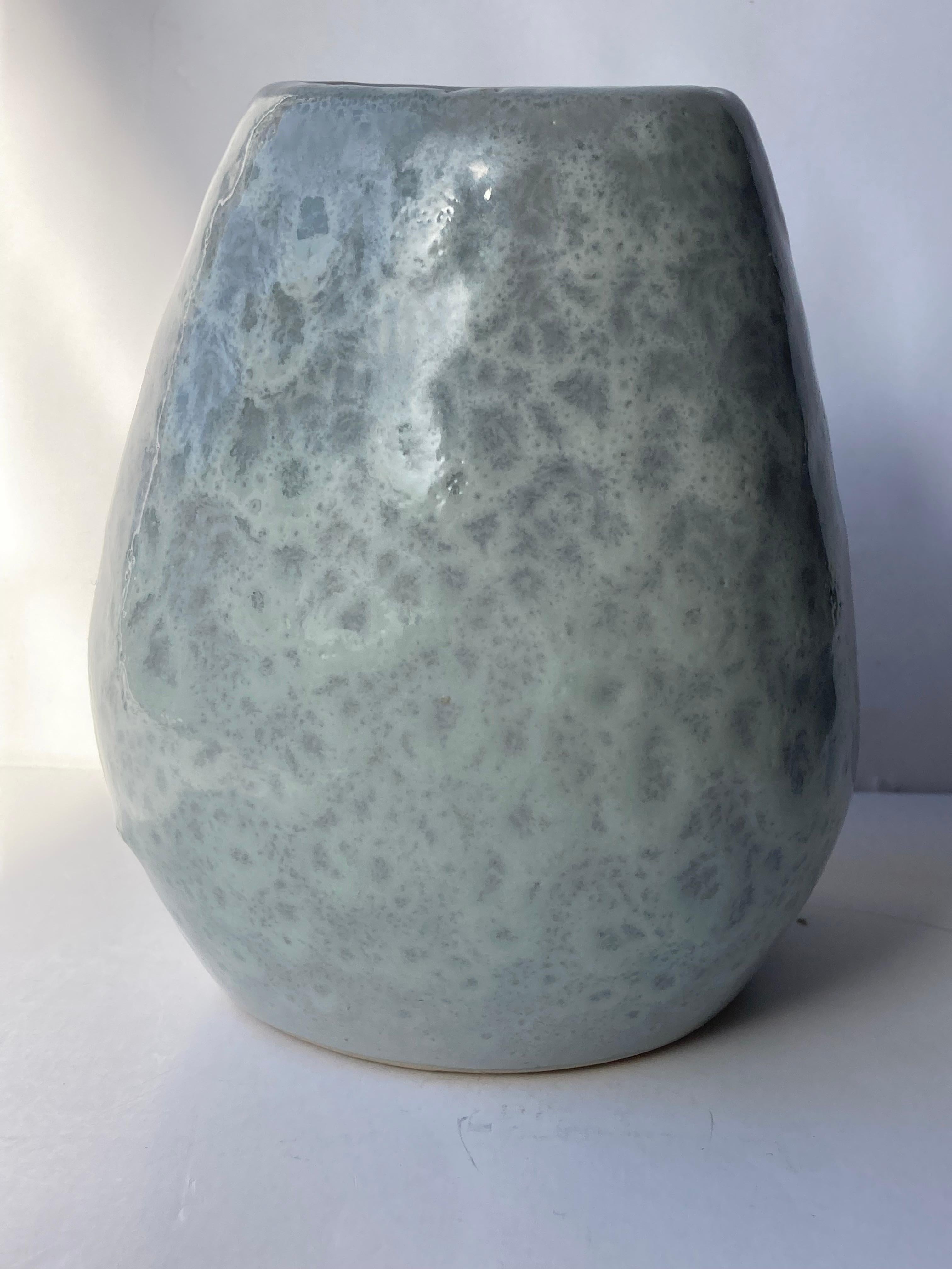 Beautiful crystalized glaze pottery vase .