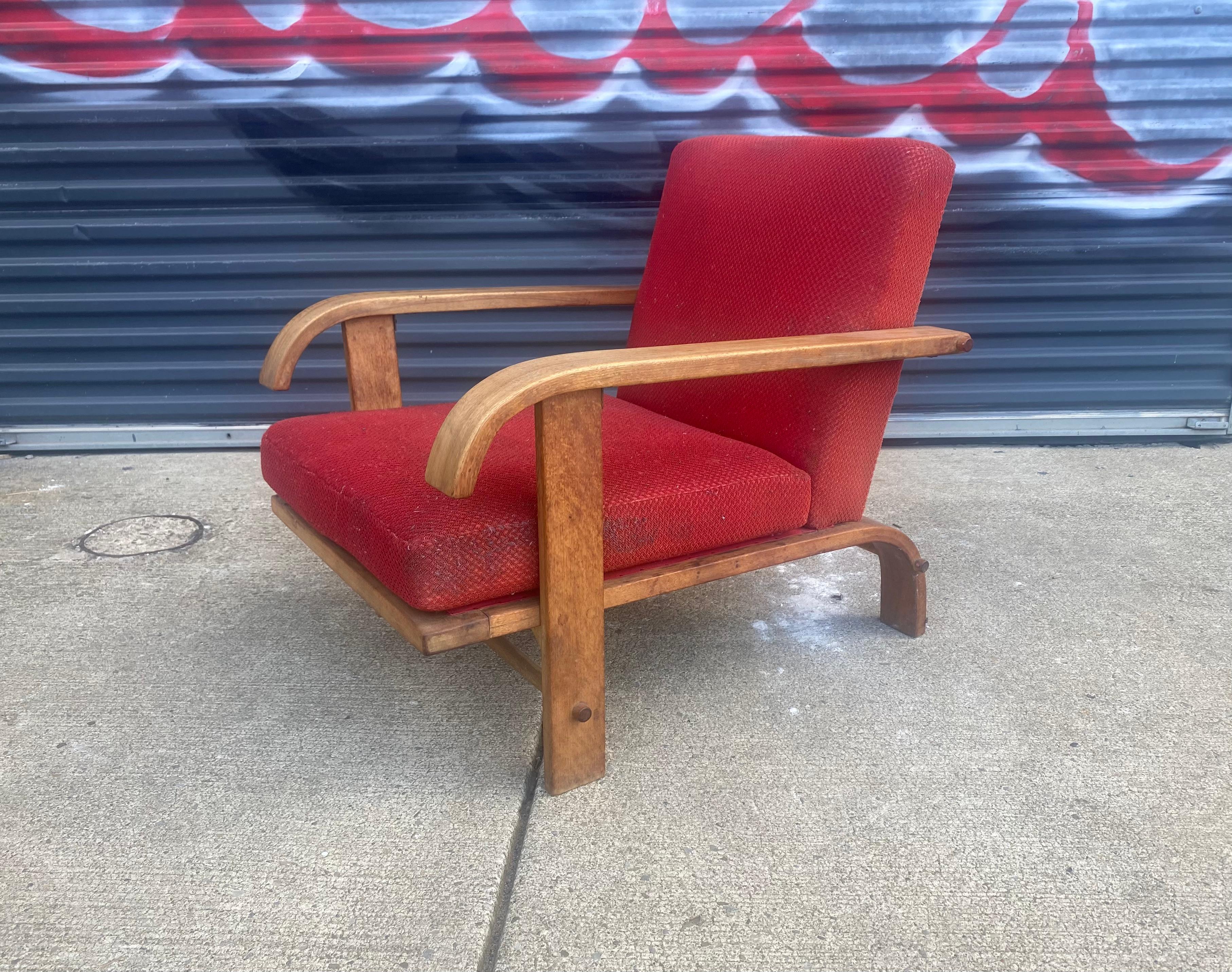 Rare Art Deco easy chair designed by Russel Wright for Conant Ball American modern in 1935 ,solid maple contraction with original cushions retains original finish ,patina..,, signed with company mark and model number.. Extremely comfortable,,Hand