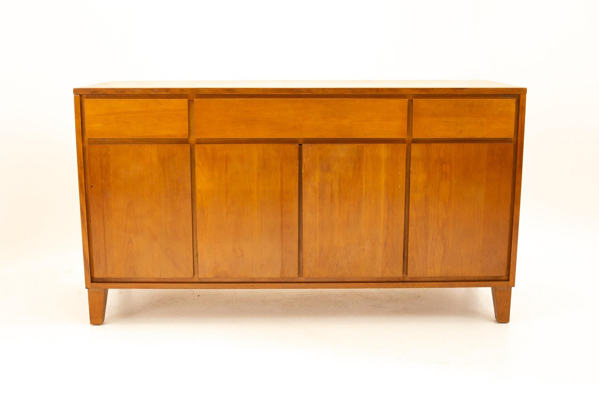 Russel Wright for Conant Ball midcentury buffet sideboard credenza
Credenza measures: 54 wide x 18.5 deep x 30.5 high

All pieces of furniture can be had in what we call restored vintage condition. That means the piece is restored upon purchase