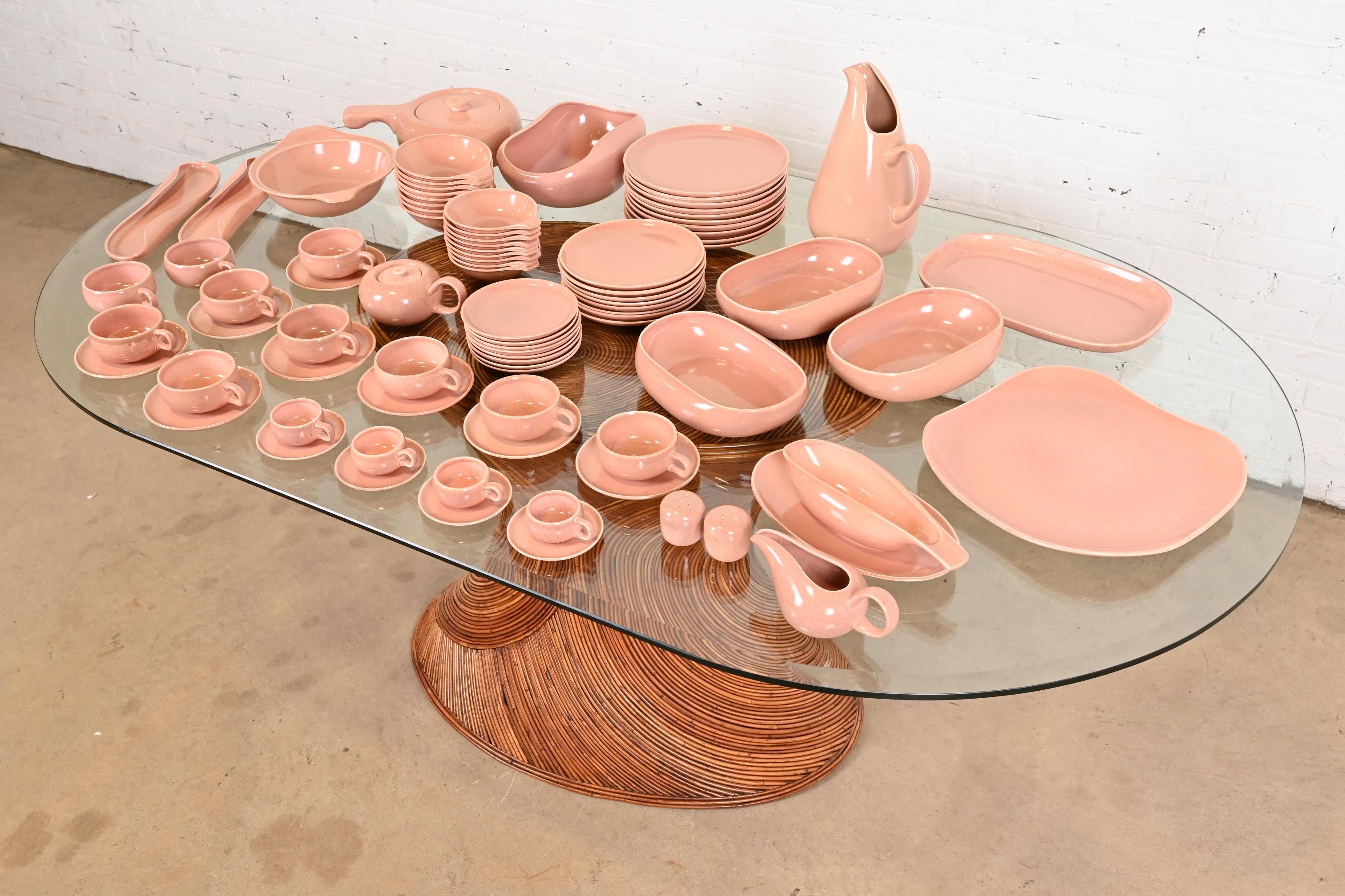 A rare large 86-piece set of glazed ceramic earthenware American Modern dinnerware in coral (a peachy light pink)

By Russel Wright for Steubenville Pottery

USA, Circa 1940s

The set includes:

10 Large Plates (10