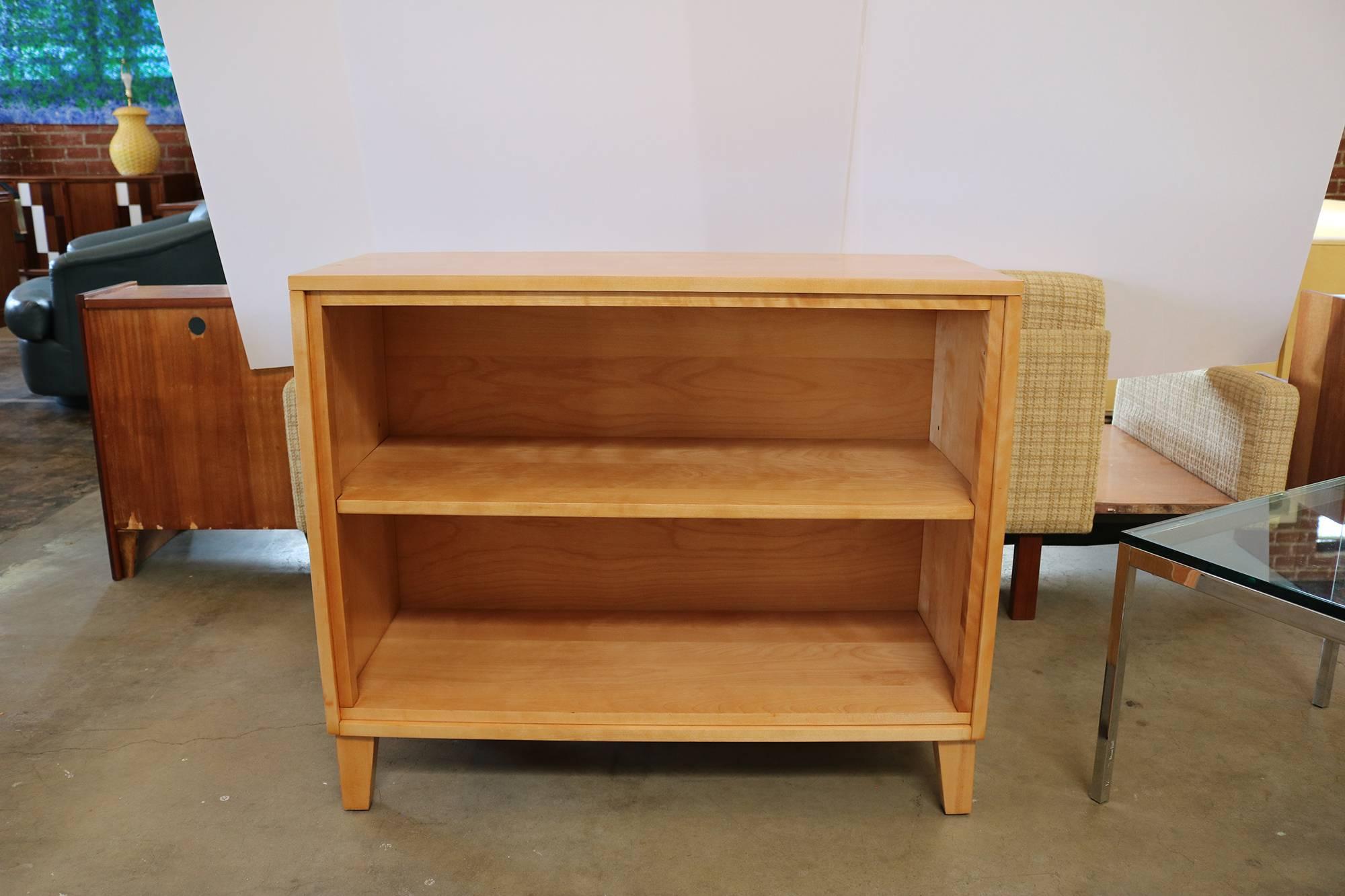 Newly small bookshelf made of solid maple by Russel Wright for Conant Ball. Russel Wright was an American industrial designer working during the early 20th century. He helped bring modern design to the North America from the late 1920s-1960s and