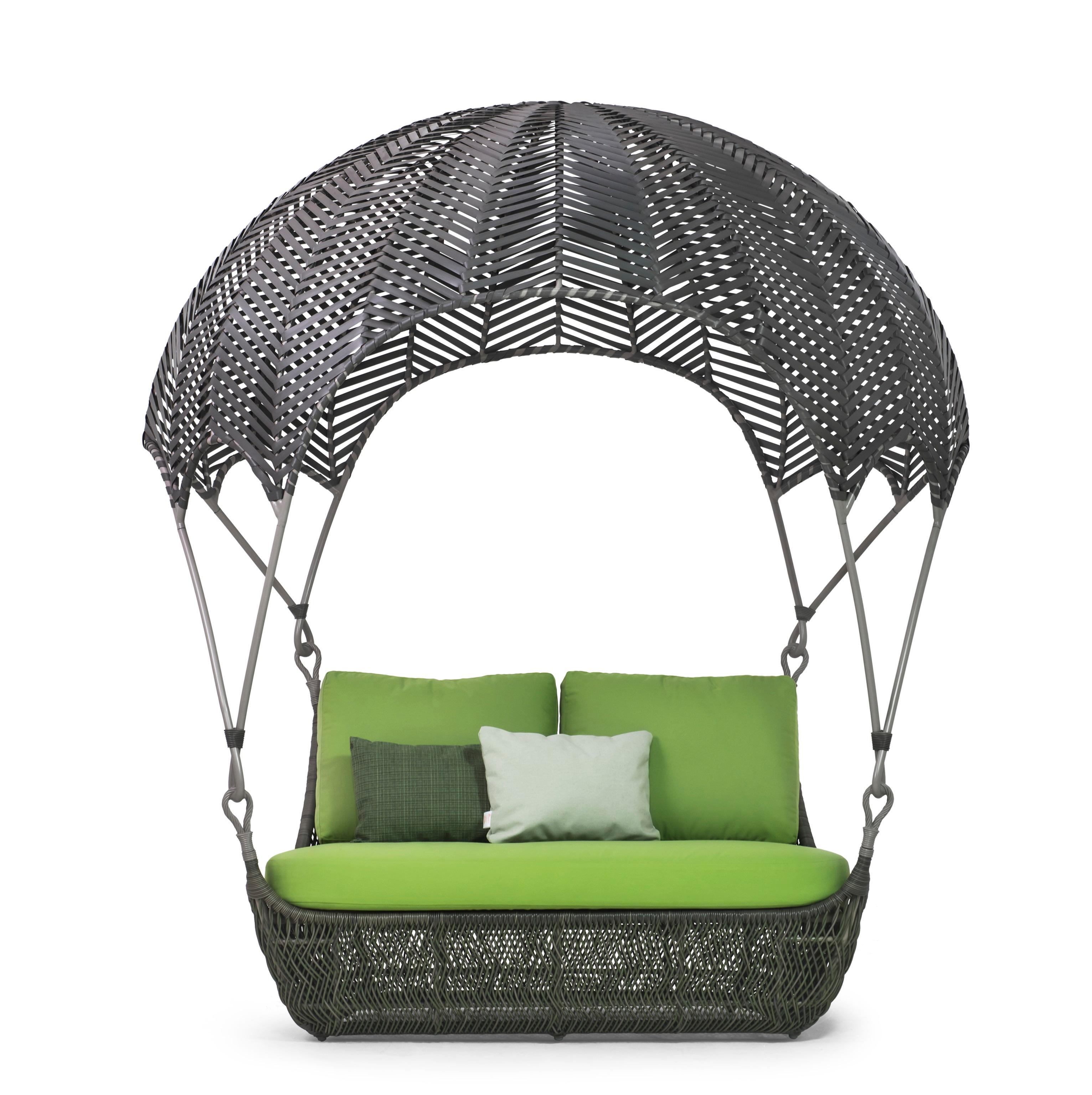 Russell loveseat by Kenneth Cobonpue.
Materials: Polyethyelene, Aluminum. 
Dimensions: 160cm x 202cm x h 220cm

Russell brings the allure of escape to your space. Rest in its airy woven frame as stories of adventure across the land, seas, and