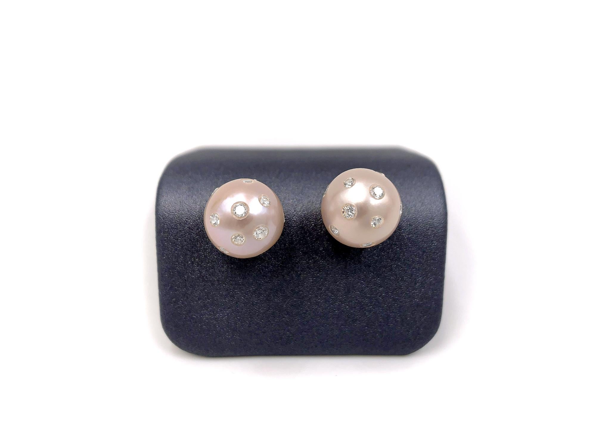 Pink Freshwater Pearl Stud Earrings handmade by jewelry designer Russell Trusso embedded with 0.32 total carats of round brilliant-cut white diamonds on 18k posts. Stamped 18k. 