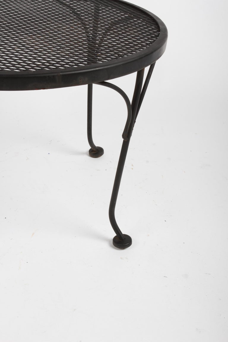 Mid-20th Century Russell Woodard Round Black Wrought Iron & Mesh Patio Coffee of Side Table For Sale