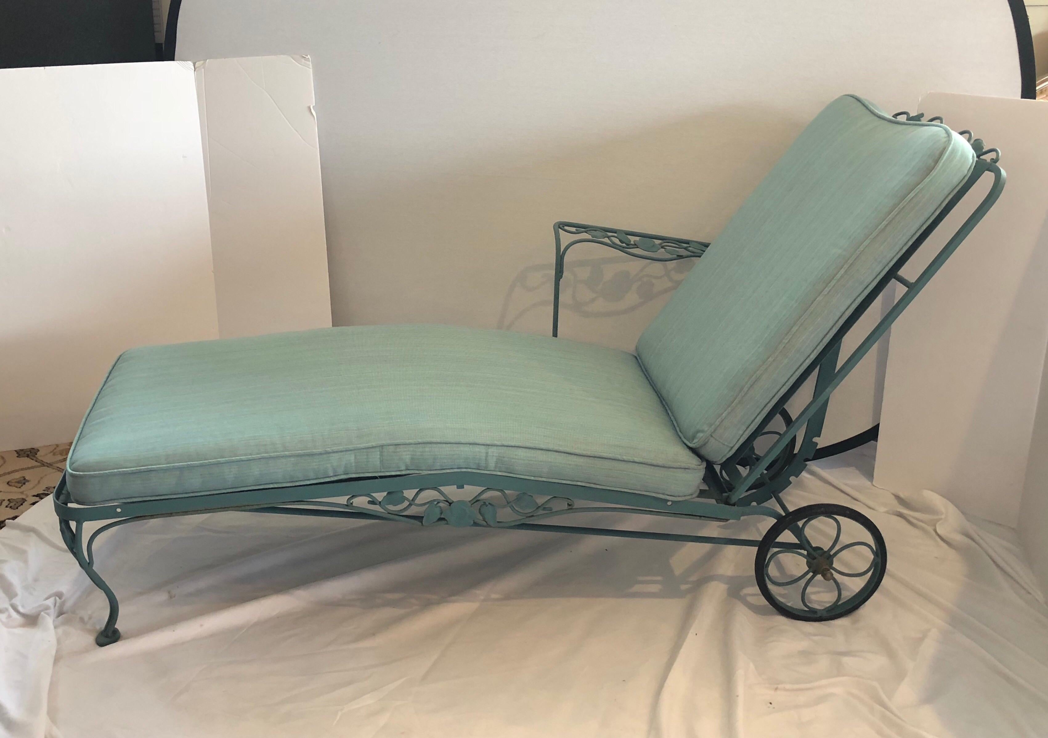 Rare Russell Woodard chaise longue with two matching nesting tables. Gorgeous metalwork and on wheels at one end for ease of movement. Has new seafoam green cushion.