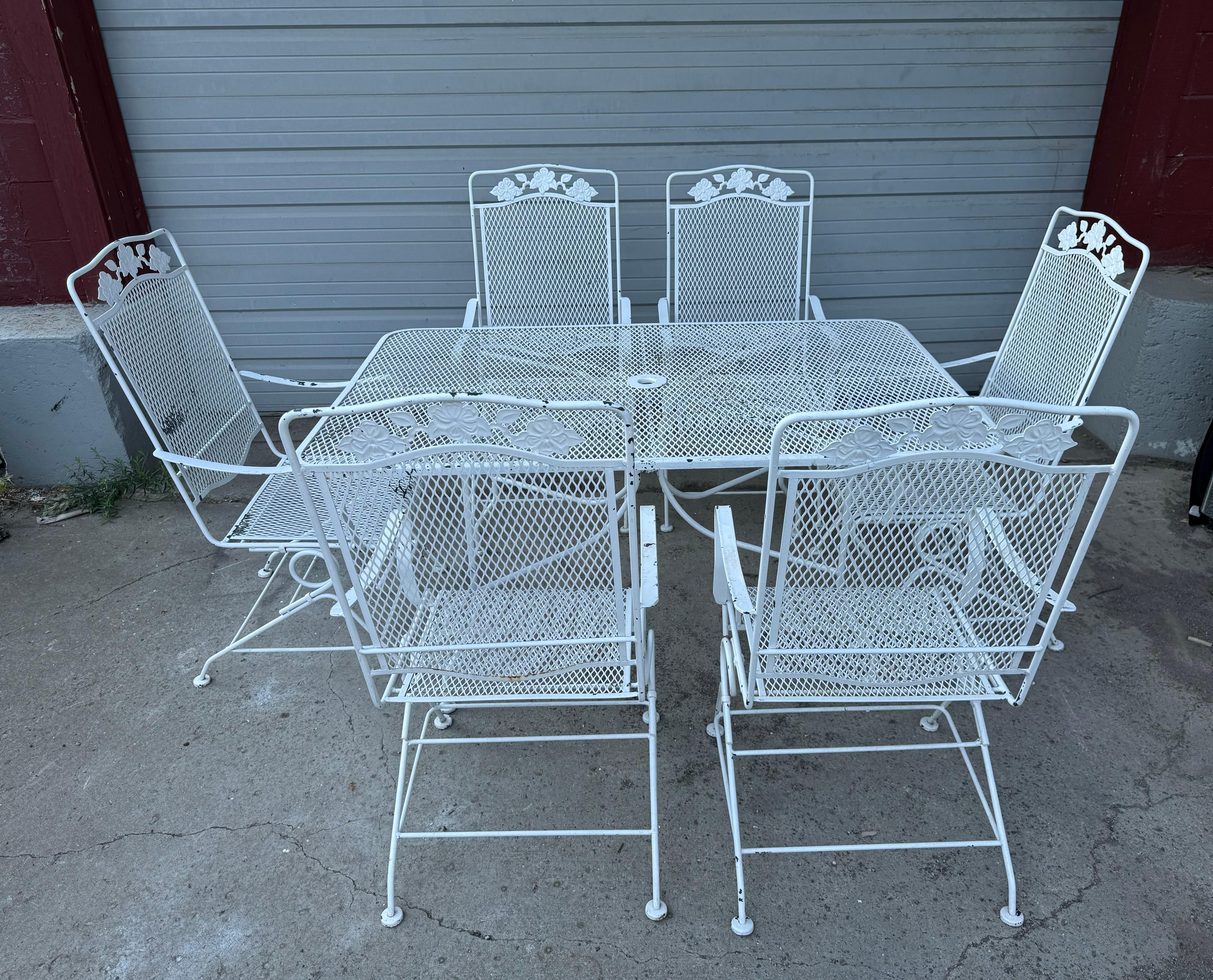 Russell Woodard Iron 7-piece Table & Chairs / Outdoor Garden Set, includes rectangular table with umbrella holder / set of 6 matching Springer Arm Chairs, Great set. Extremely comfortable,Hand delivery avail to nEW yORK cITY OR ANYWHERE EN ROUTE