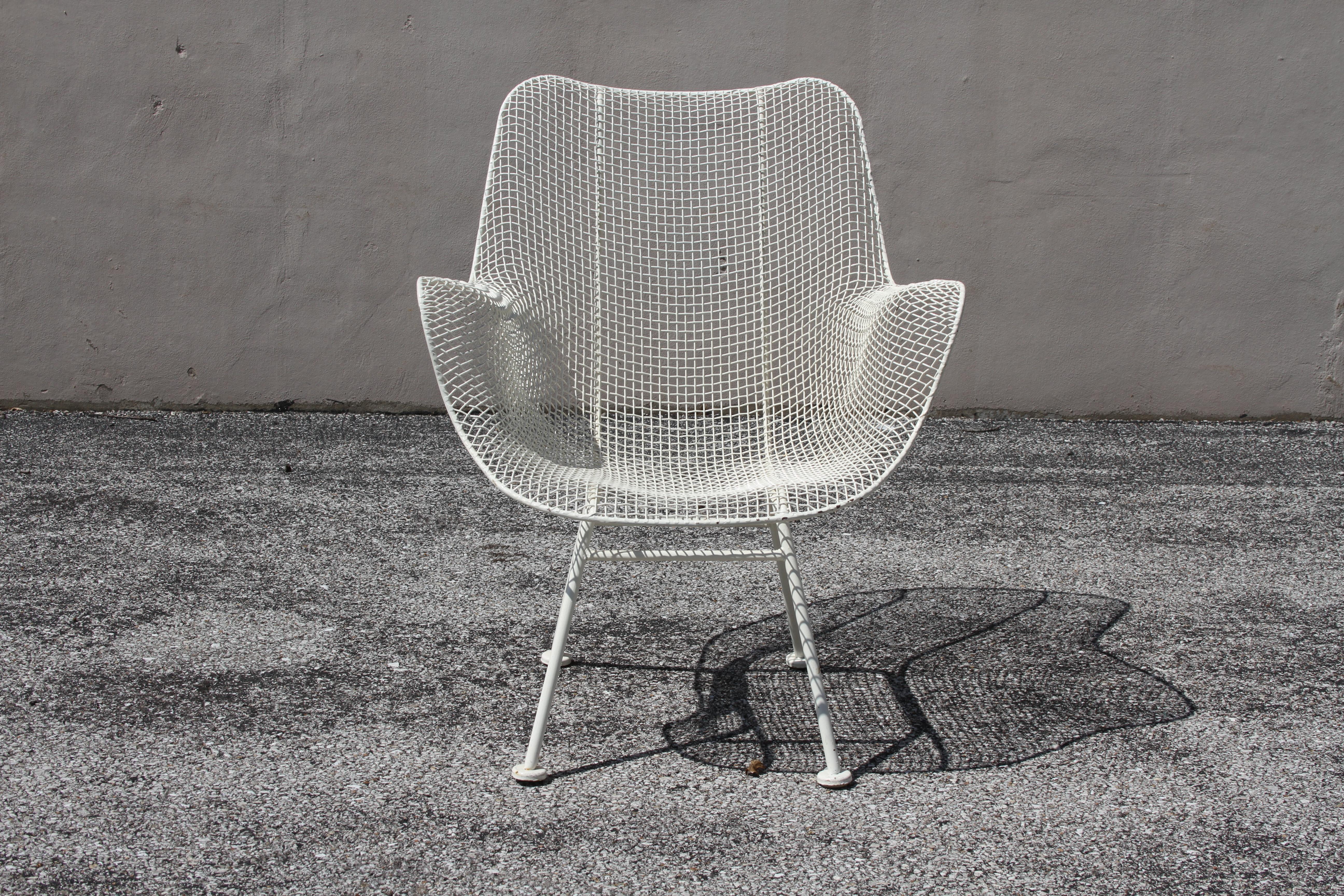Mid-Century Modern Russell Woodard for Woodard mesh Sculptura high back lounge chair. Older white paint, shows some wear, loss to paint. Can be sandblasted, dipped in rust-prohibitor and painted for additional cost.