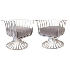 Russell Woodard Midcentury Pair of Polished Aluminum Swivel Armchairs