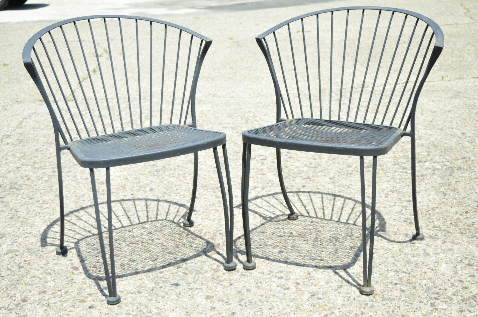 Russell Woodard pinecrest wrought iron outdoor garden dining chairs - set of 4. Set includes (4) side chairs, wrought iron construction, barrel back, clean Modernist lines, great style and form. Circa Mid to Late 20th Century. Measurements: 31.5