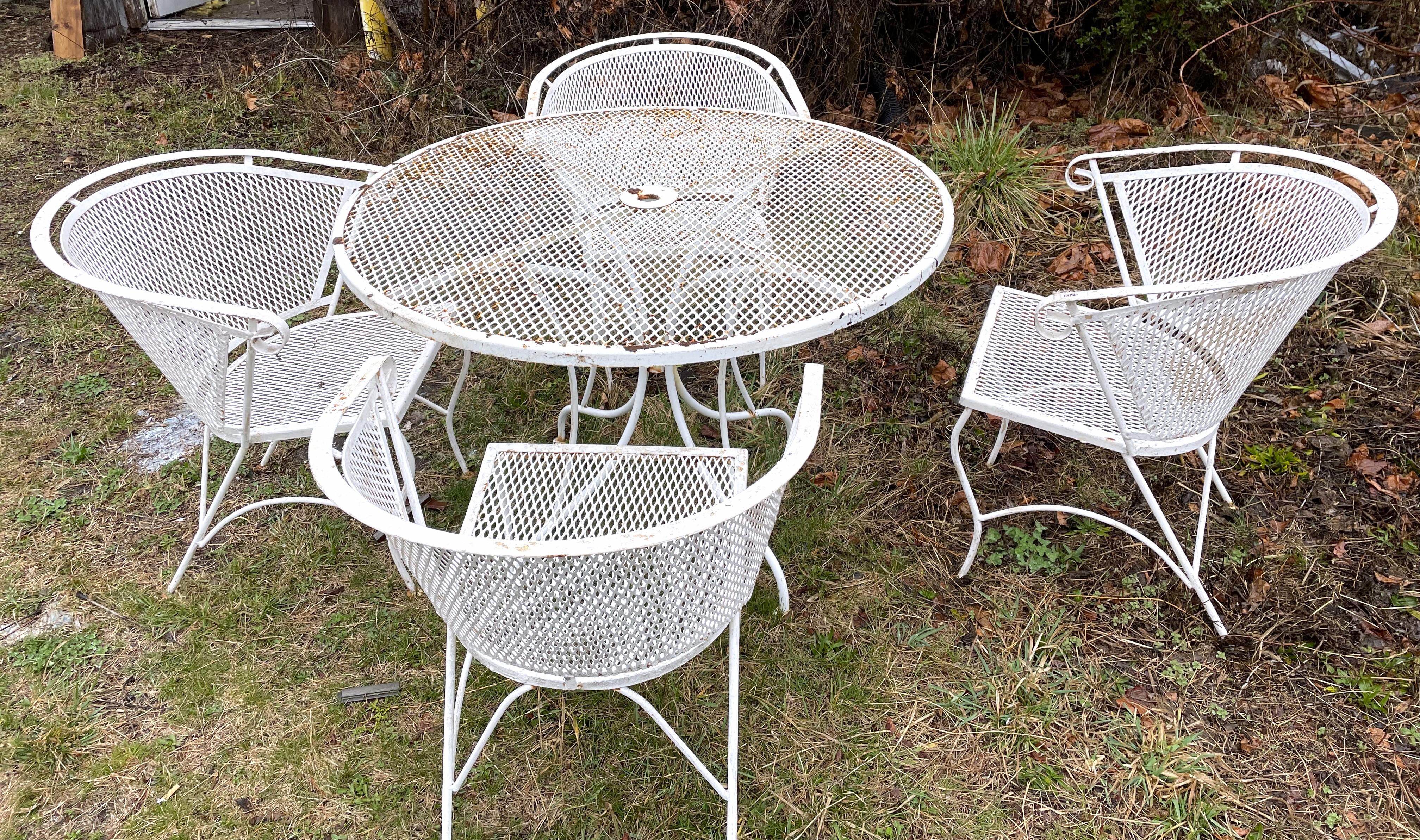 Here is a great looking and comfortable set that is just what you need for your outdoor celebrations this summer. The entire set is structurally very sturdy but the paint has worn and there is some rust especially on the table, redone in the color