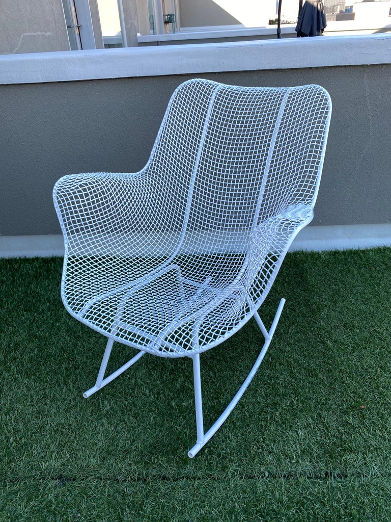 Russell Woodard sculptura rocker, powder coated about 15 years ago. Paint in nice shape but does show a little fading.