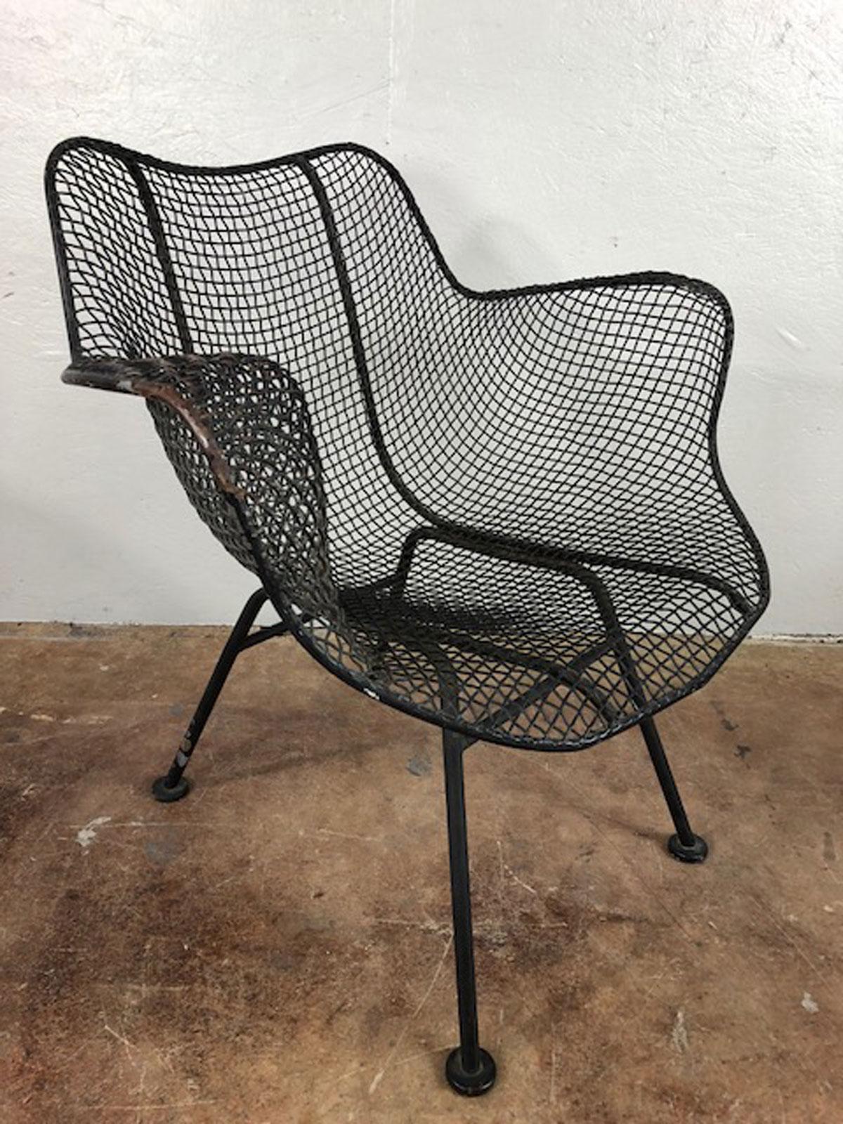 Set of four Russell Woodard Sculptura chairs with arms in original acquisition condition. Nice patina. Very good condition. Solid construction.