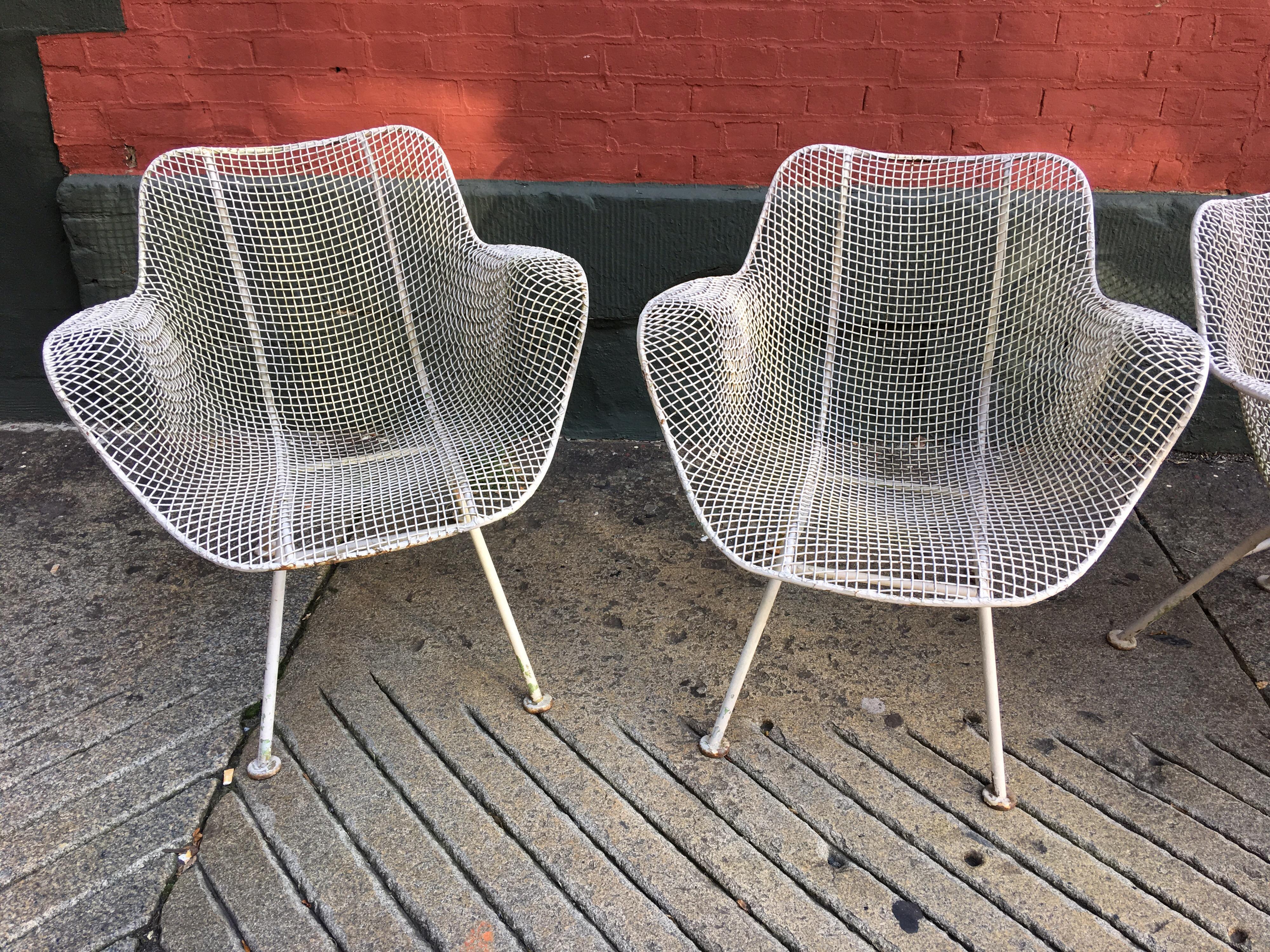 Nice Matched set of 4 John Woodard Patio Chairs in an off white. Several coats of paint! Powder Coating Services Available.