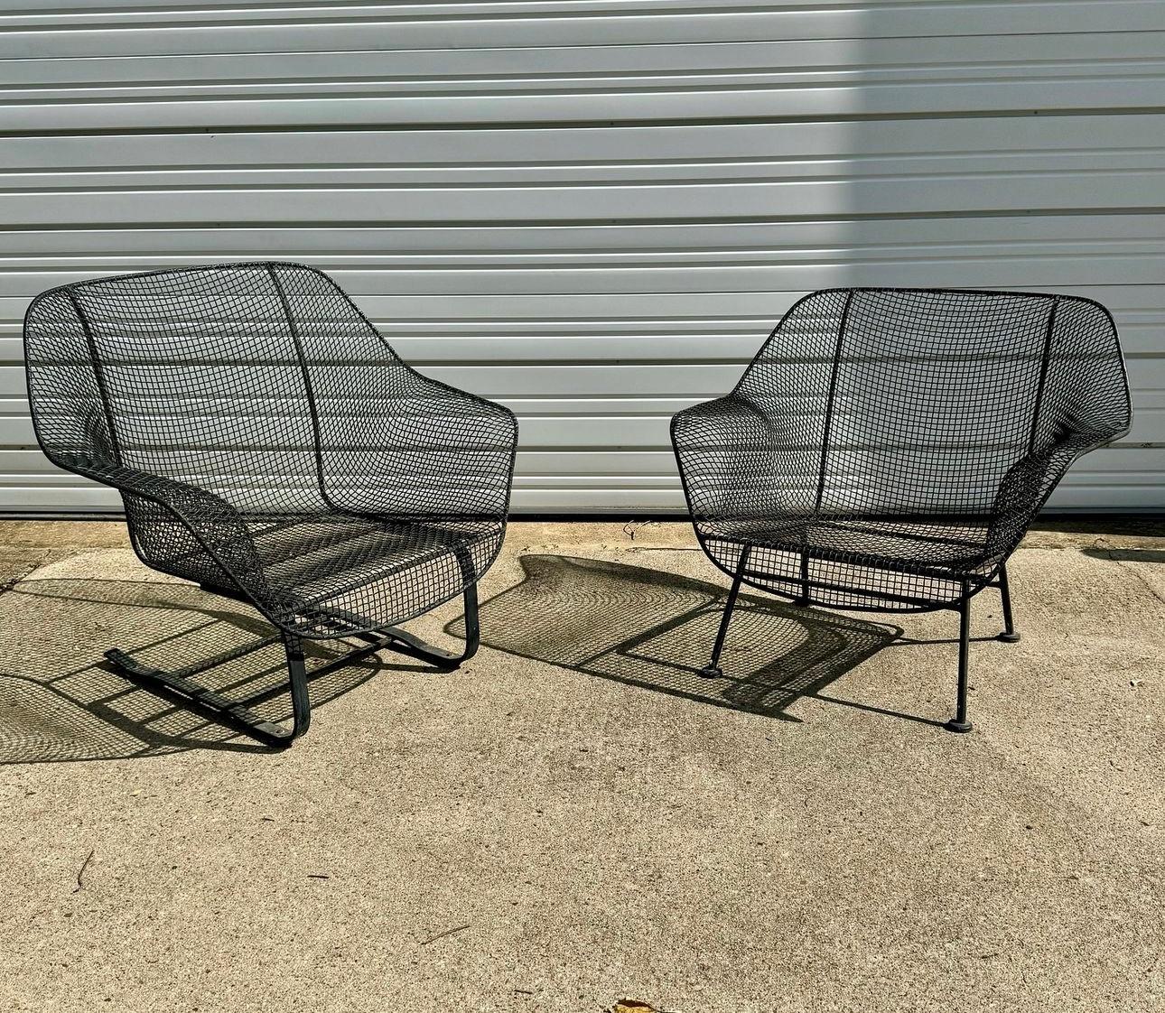 Beautiful Russell Woodard lounge chairs made out of wrought iron with steel and mesh. Included in the set is a standard lounge chair and a spring chair. The measurements for the chair without spring are: 33