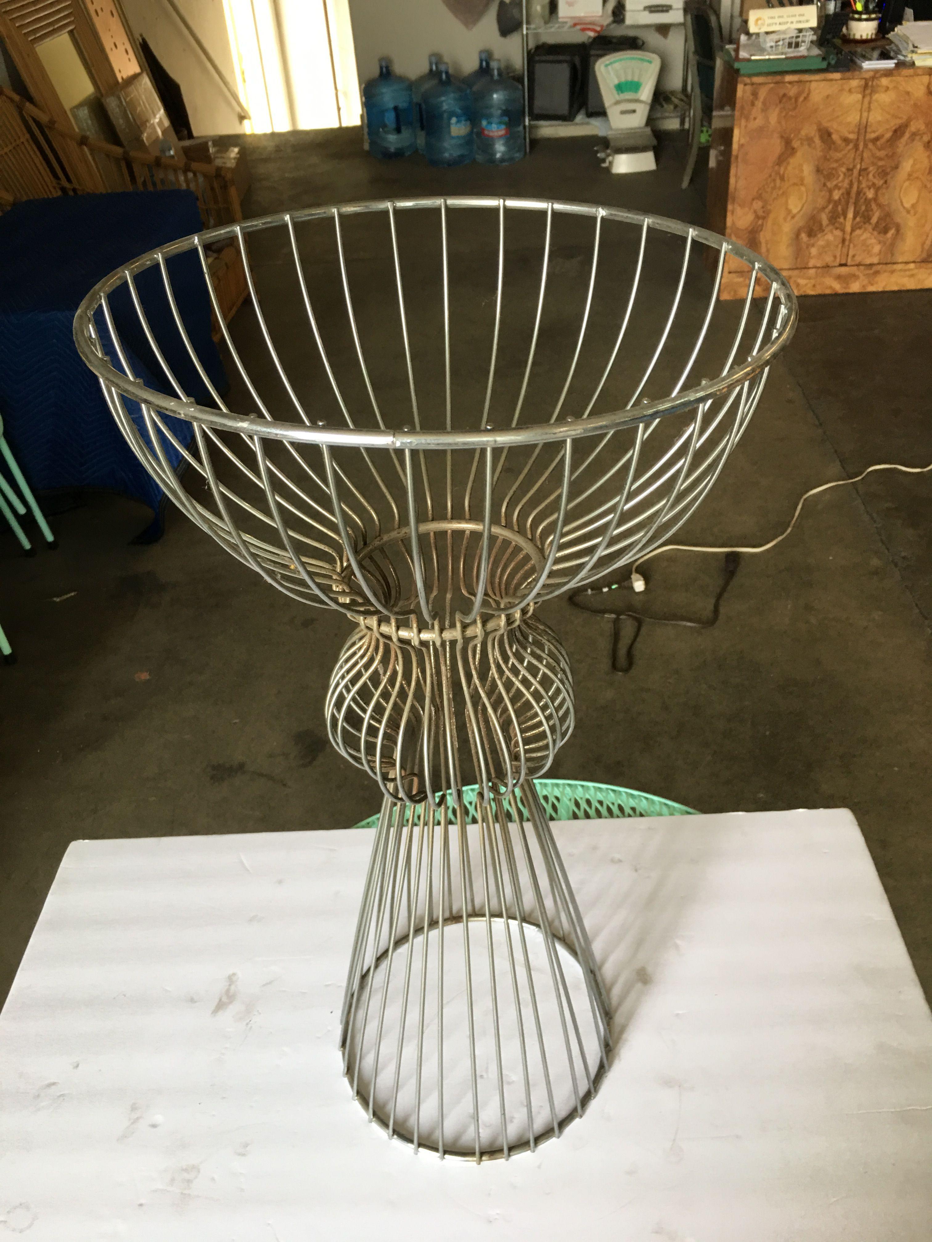 Midcentury chrome wire frame sculptural hourglass plant stand fashion much like the furniture designed by Russell Woodard. Unsigned, circa 1960.