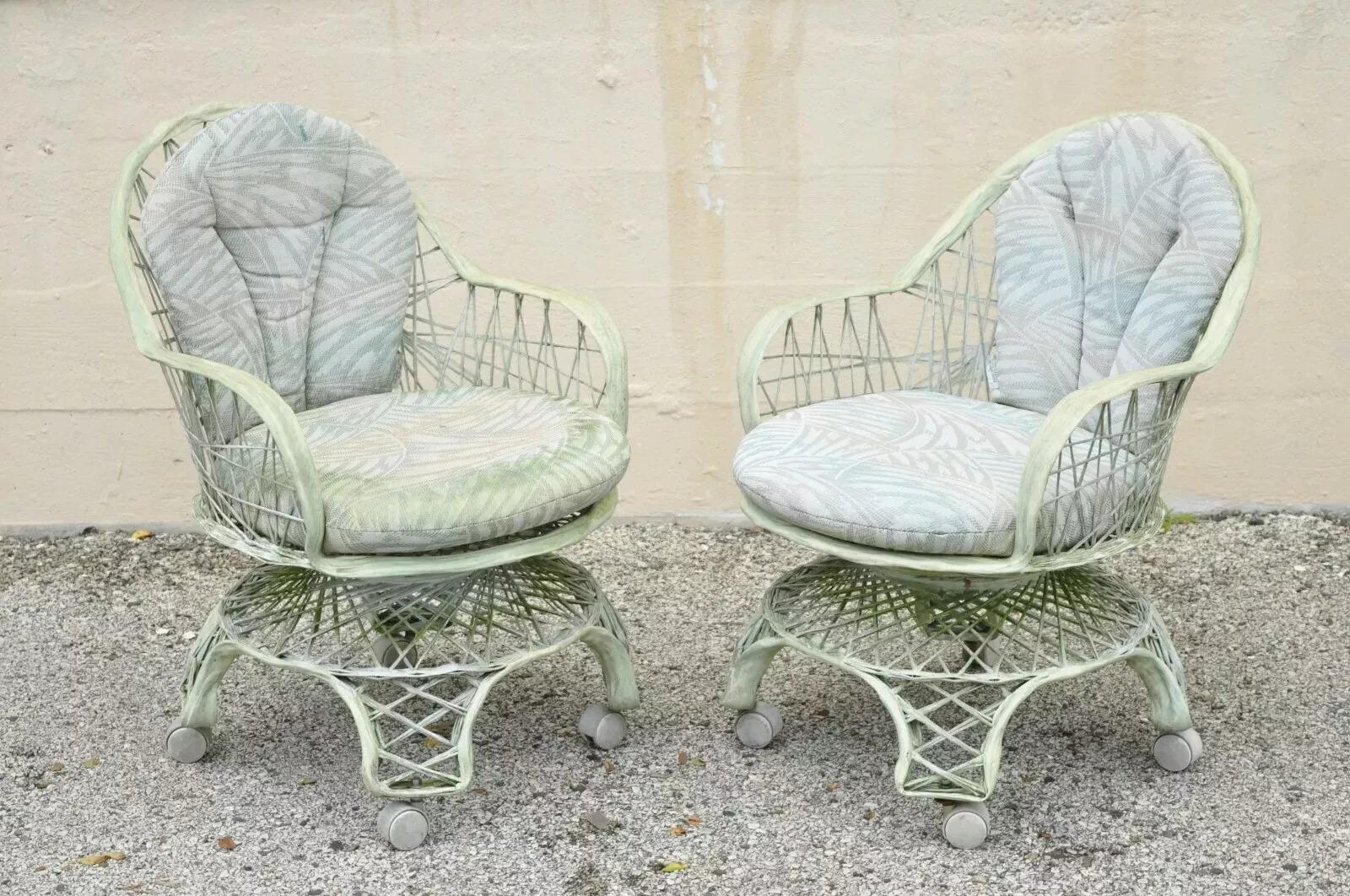 Vintage Russell Woodard Woven Spun Fiberglass Swivel Rolling Club Lounge Chairs and Ottoman. Item features a woven spun fiberglass frames, (2) swivel rolling club chairs, (1) round ottoman, all with loose cushions, great style and form. Circa Mid