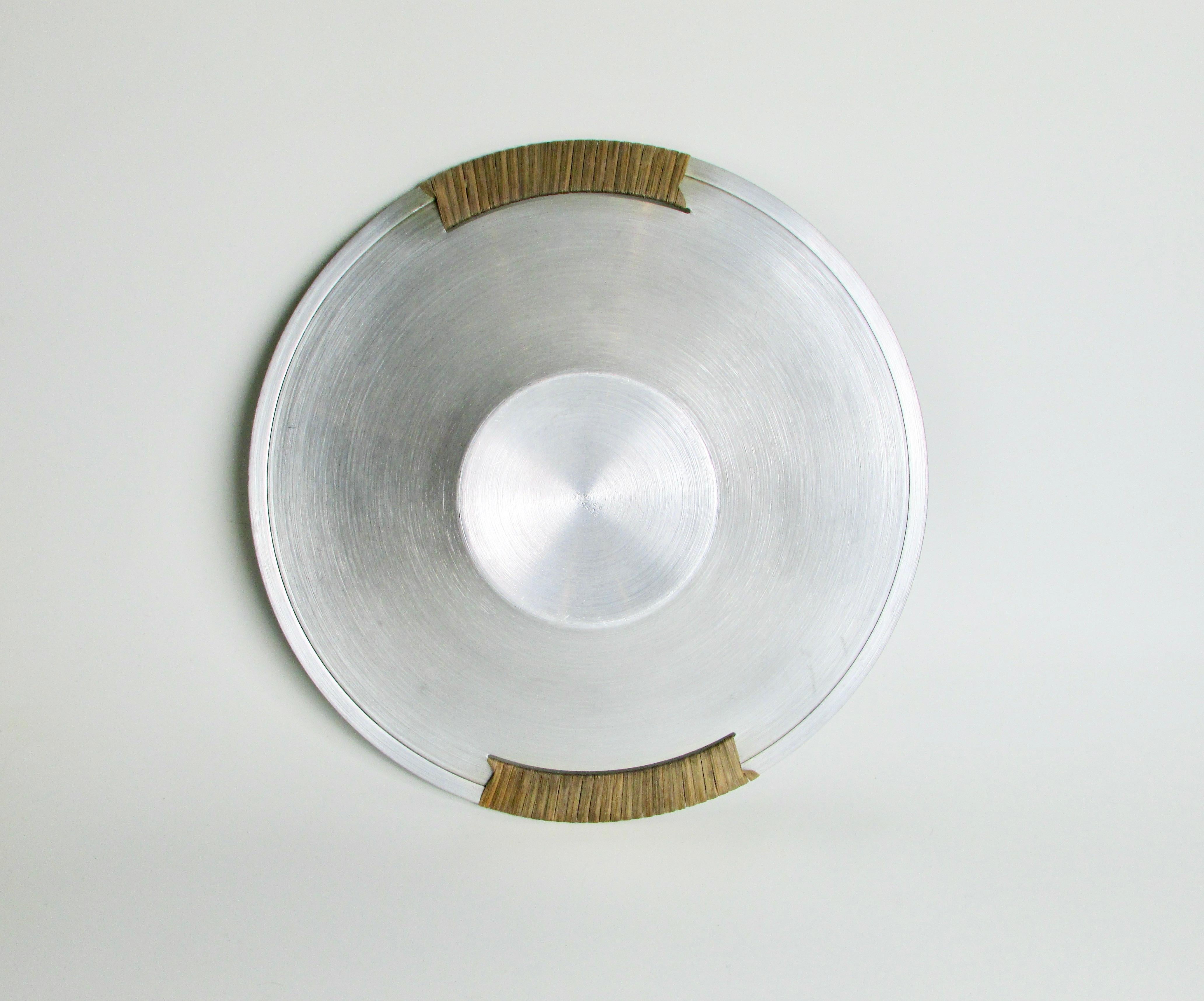 Mid-Century Modern Russell Wright spun aluminum bowl with raffia wrap . 