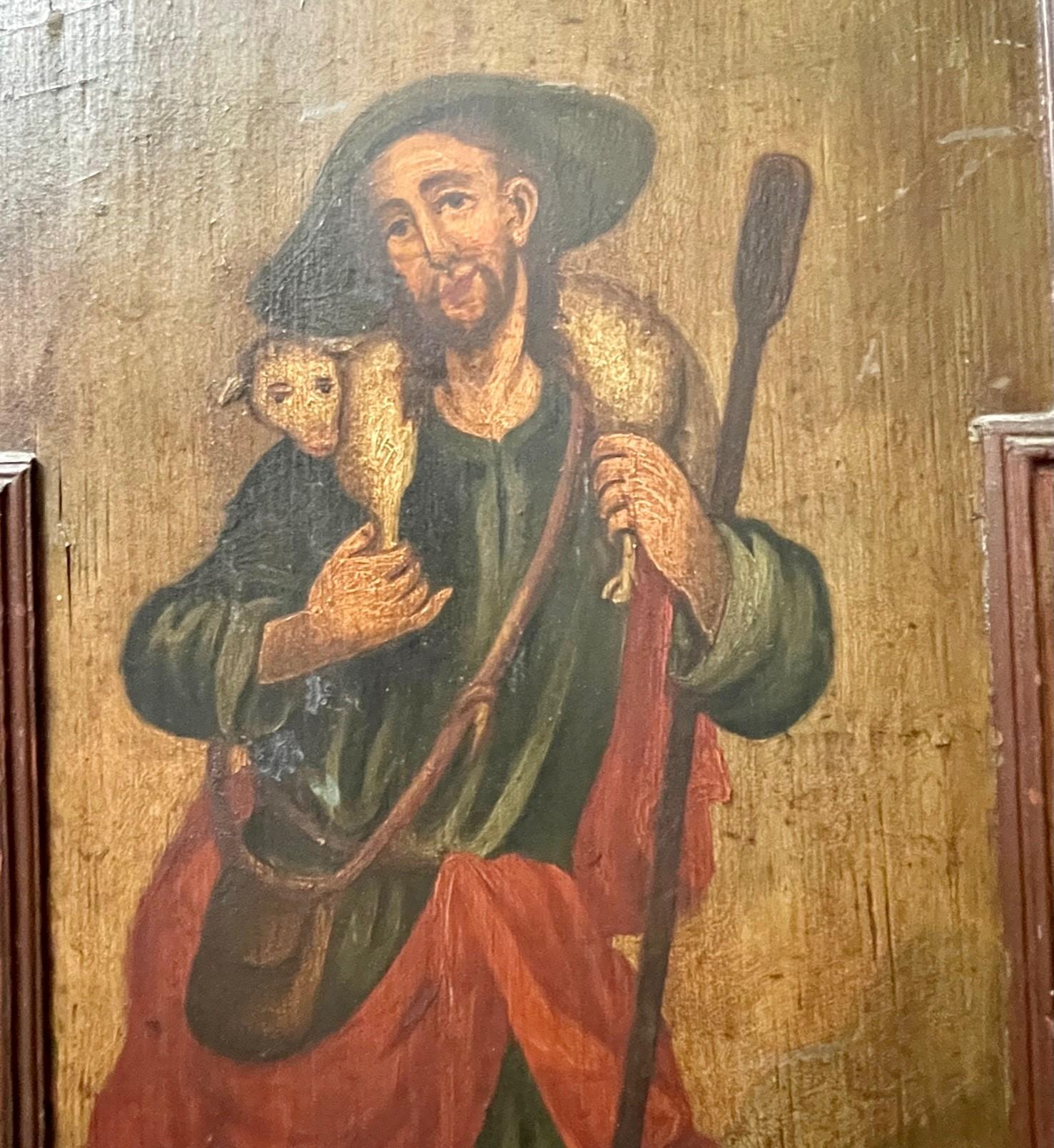 Russian 19th century icon painting on wood, The Good Shepherd

Hand painted rustic style icon painting full portrait of the Good Shepherd with his flock of sheep. The icon is painted on a large thick wooden board with a walnut frame in geometric