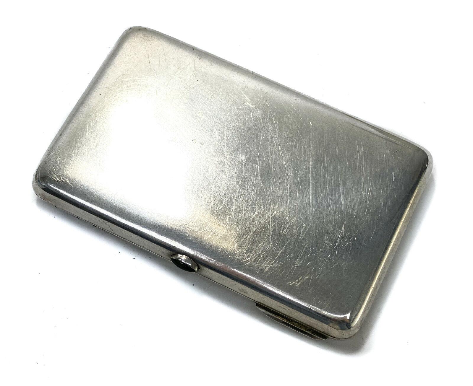 Russian 84 silver cigarette case Moscow Second Kokoshnik, 1908-1926.

Engraved aesthetic design. Back is plain. With green jewel on clasp, gilt interior. With unknown maker mark in cyrillic Ð˜Ð or IA in English.

Additional