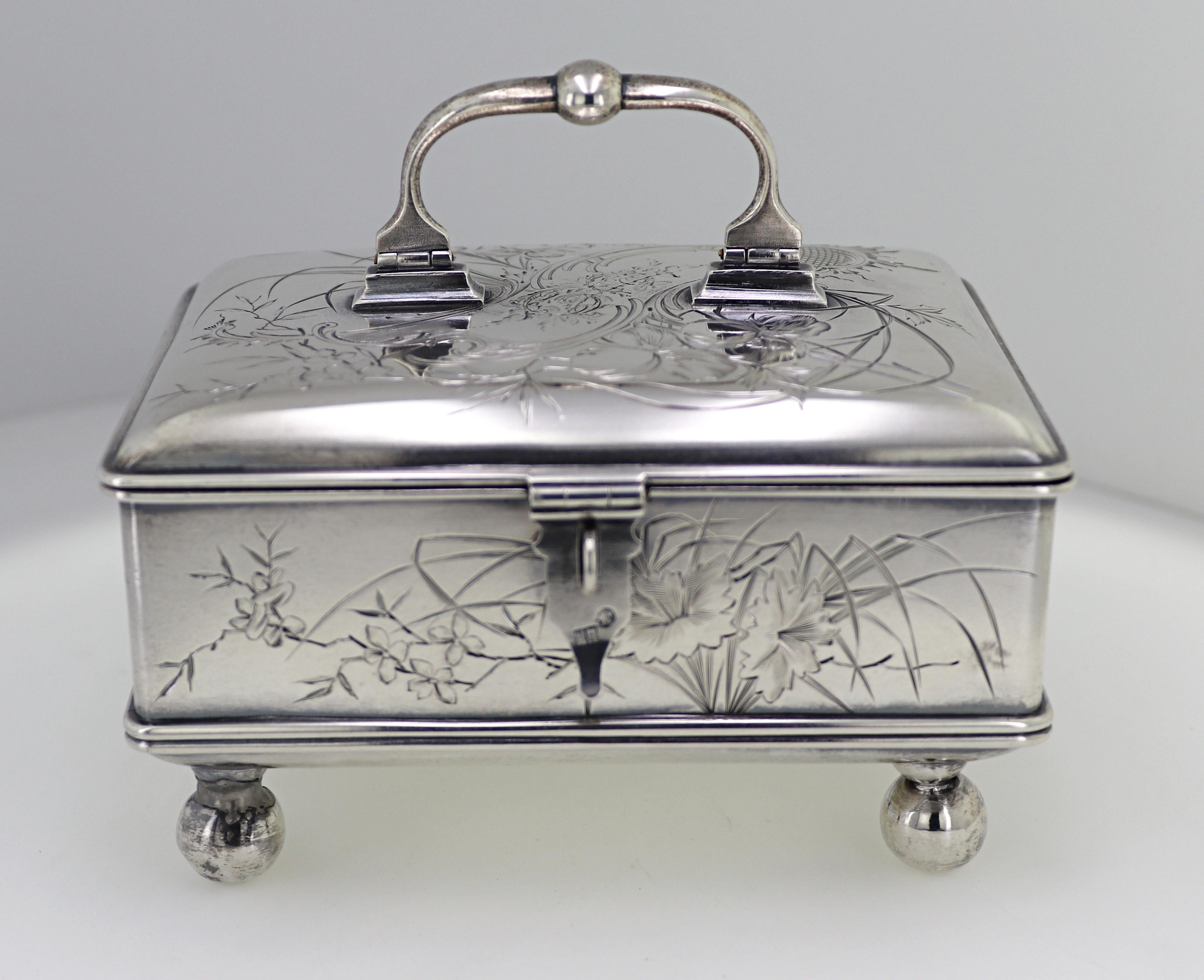 The sterling silver box features beautiful hand engraved natural flower and
foliate motifs on all four sides, and lid, with hinged handle and fold down
locking latch, 5 ¼ X 3 ¾ X 4 ½ inches, marked Russian hallmarks, Weight:
377.22 grams (12.12 troy