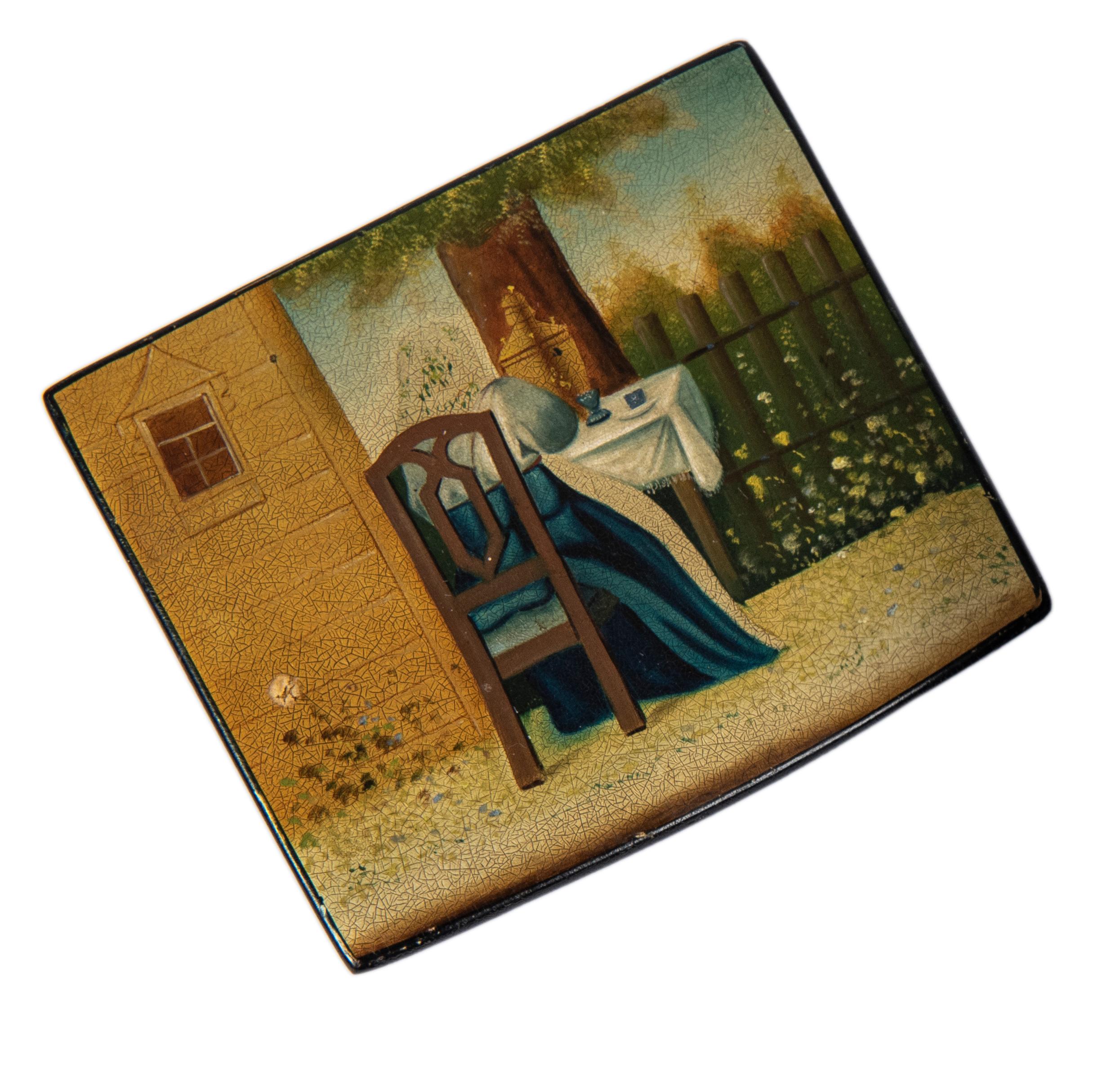 A delightful Russian tea caddy from the Romanov era, period of Tsar Alexander III, rectangular, the hinged cover painted with woman wearing a babushka seated outdoors next to a dacha, her back to the viewer enjoying tea from a samovar. The sides and